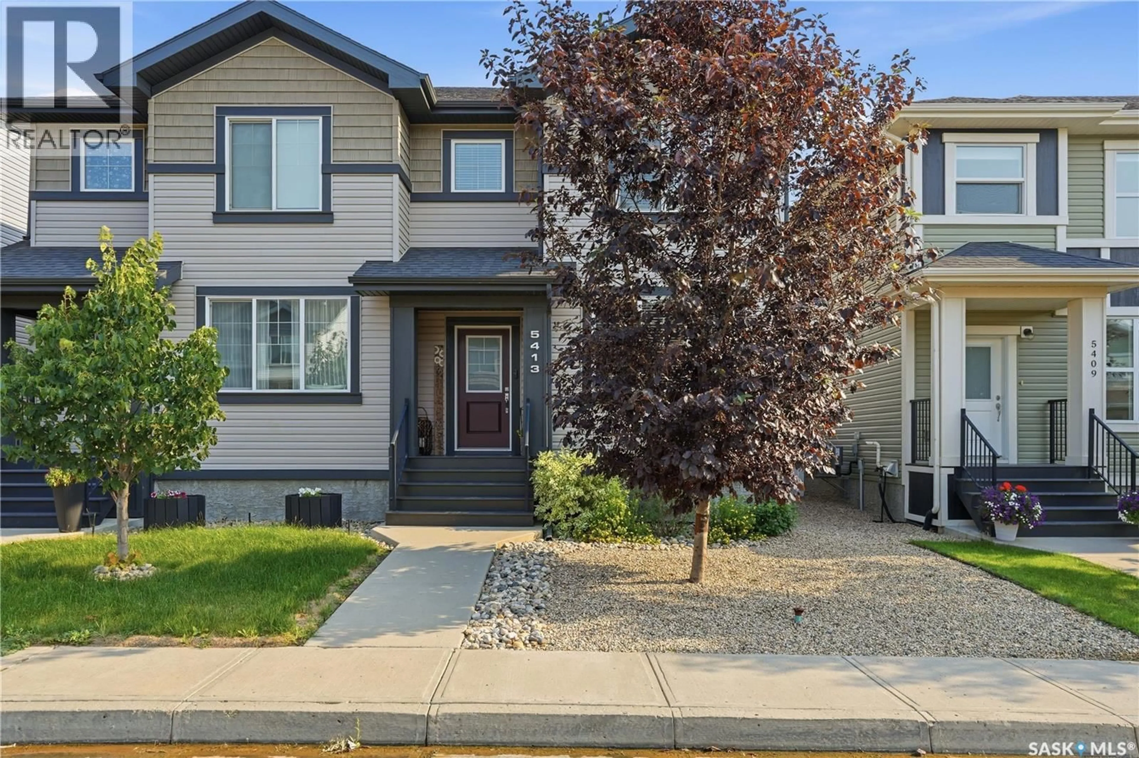 Home with vinyl exterior material, street for 5413 GREEN SILVERBERRY DRIVE, Regina Saskatchewan S4V3M5