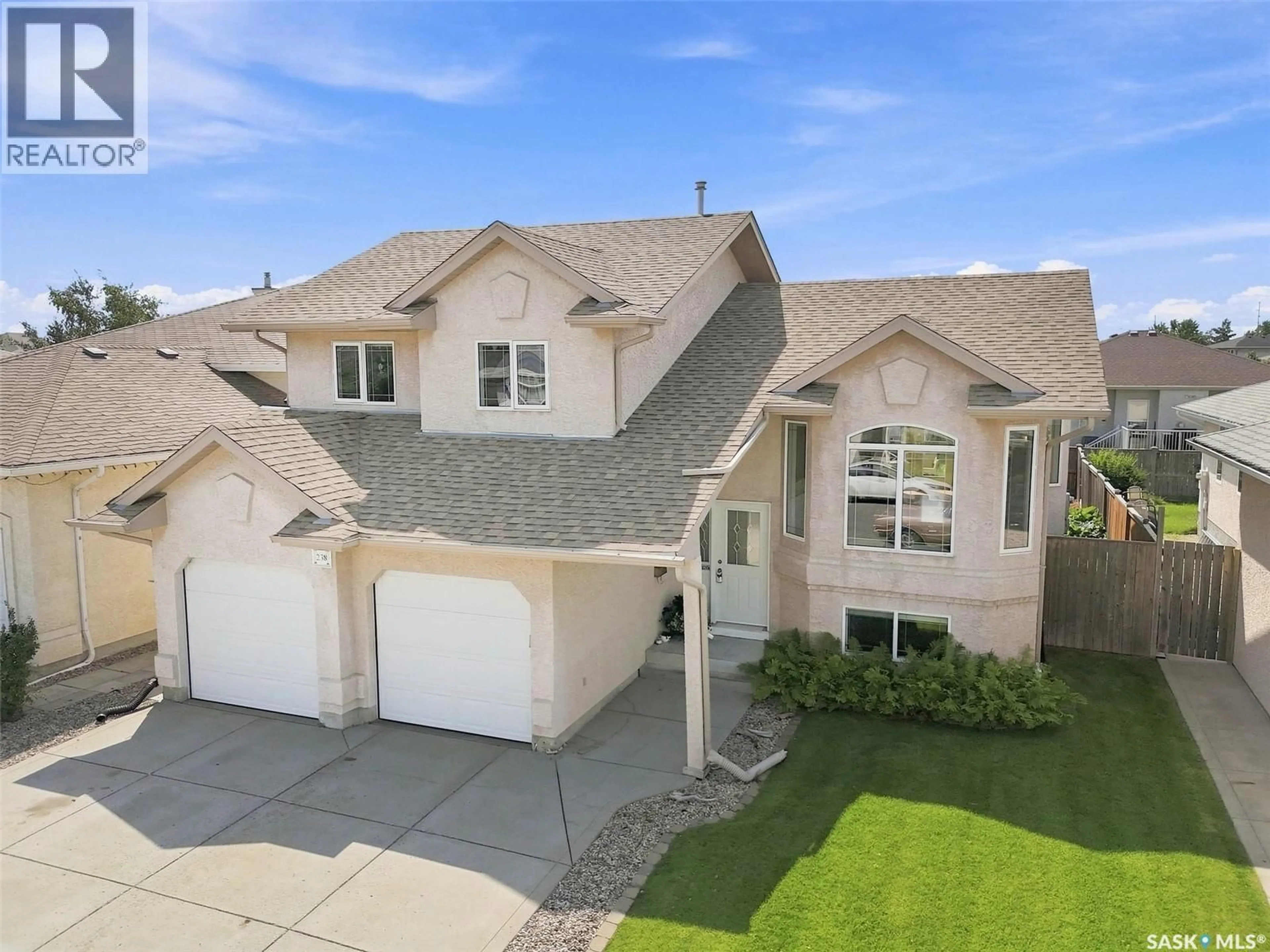 A pic from outside/outdoor area/front of a property/back of a property/a pic from drone, street for 238 BLACKBURN CRESCENT, Saskatoon Saskatchewan S7V1E9