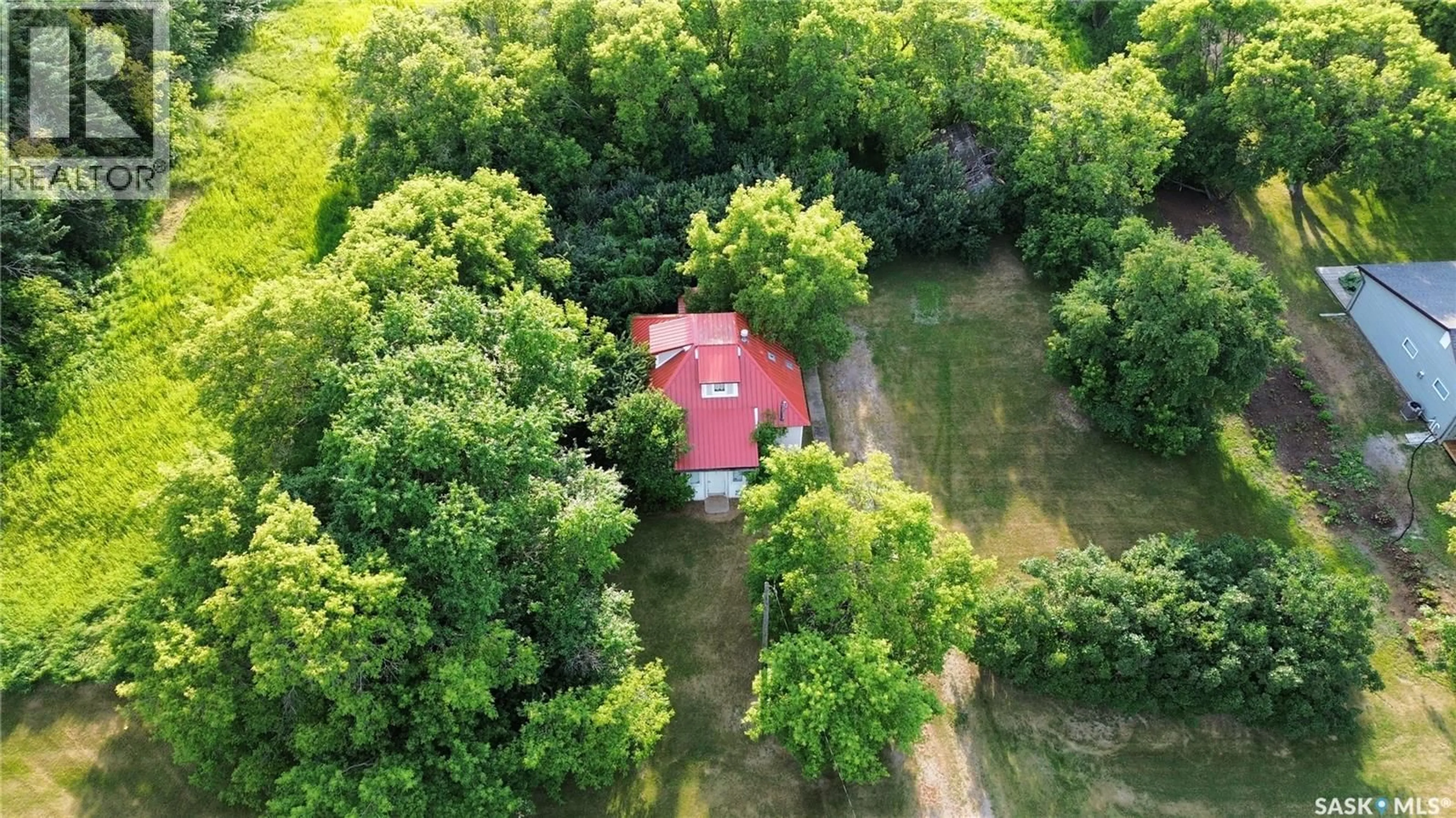 A pic from outside/outdoor area/front of a property/back of a property/a pic from drone, forest/trees view for 301 ELIZABETH STREET, Stockholm Saskatchewan S0A3Y0