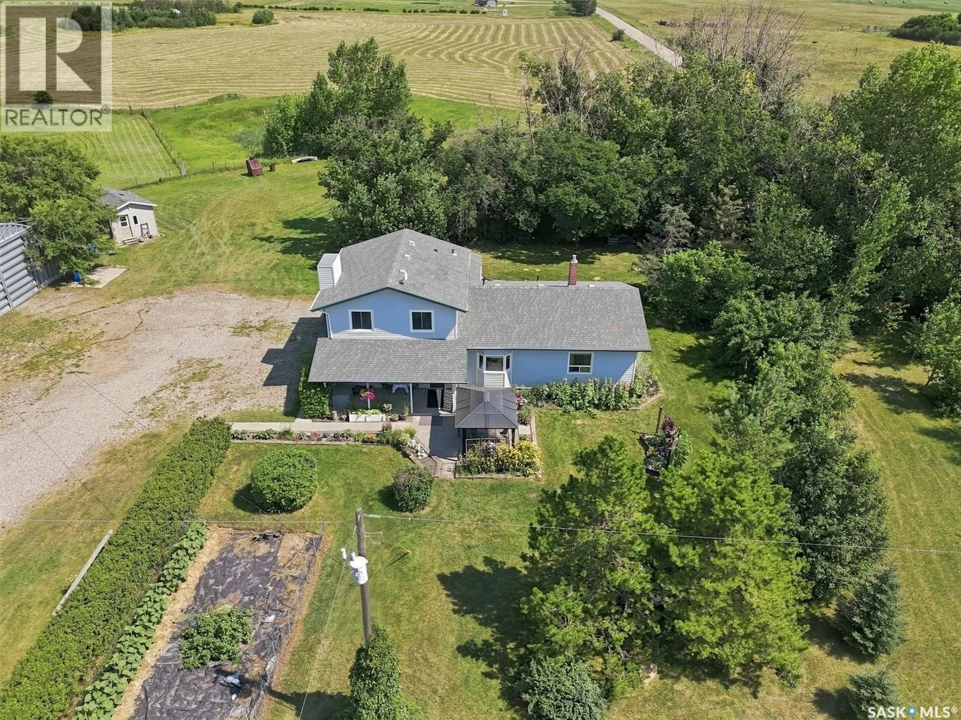 A pic from outside/outdoor area/front of a property/back of a property/a pic from drone, unknown for WRIGHT ACREAGE, Corman Park Rm No. 344 Saskatchewan S7K3J5