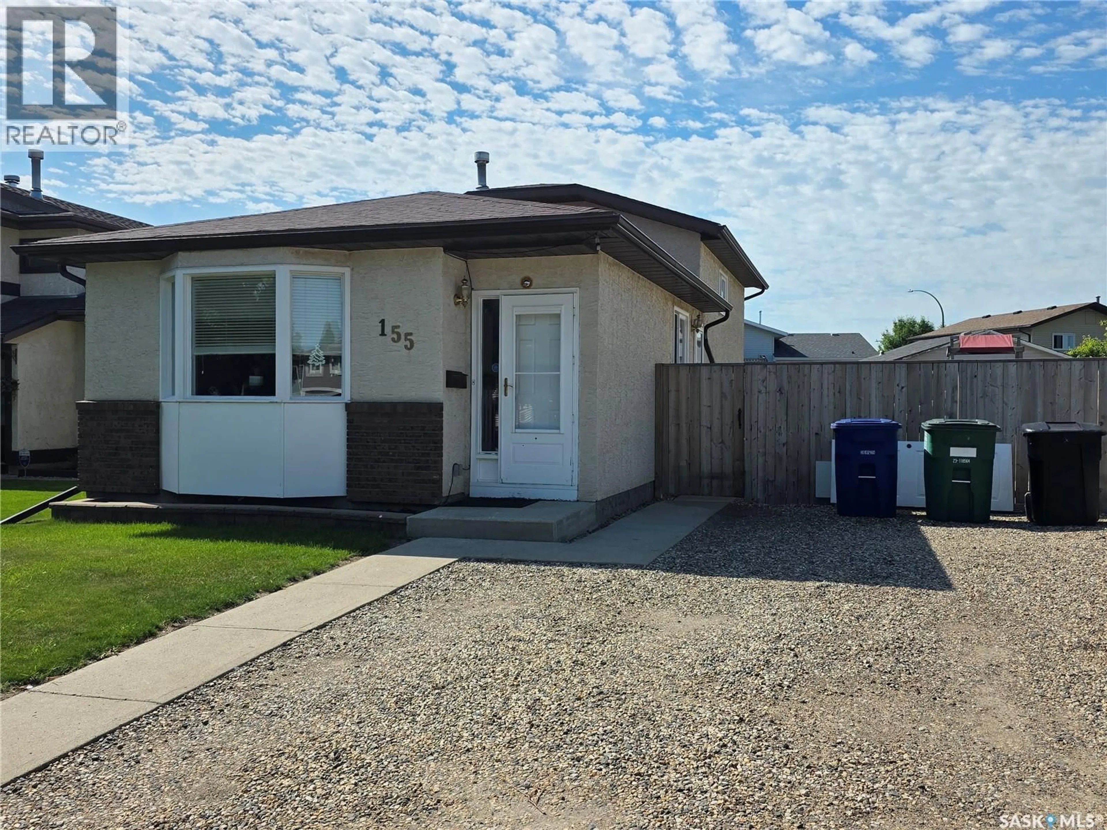 Home with vinyl exterior material, street for 155 CARTER CRESCENT, Saskatoon Saskatchewan S7L7K4