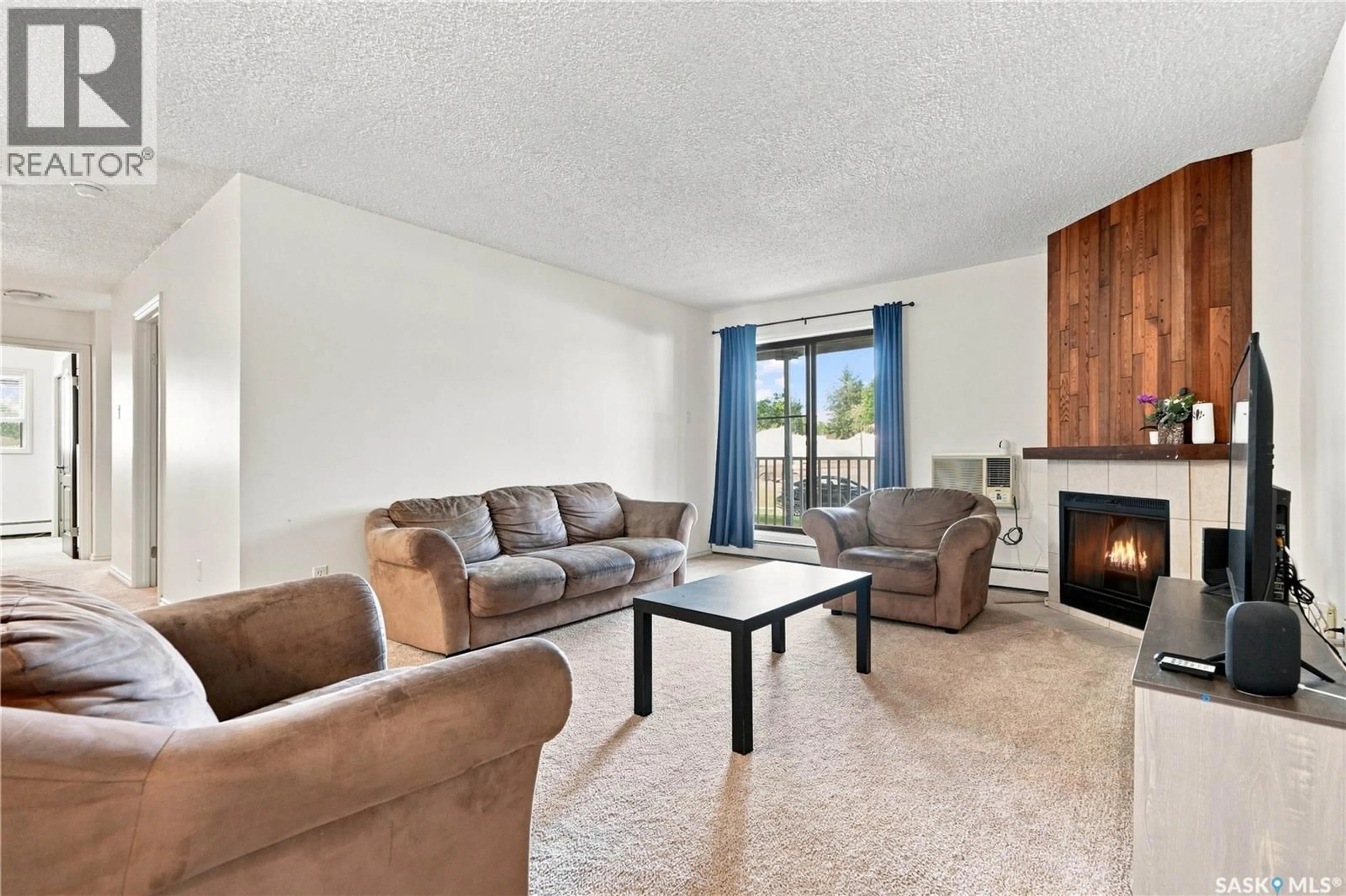 Living room with furniture, unknown for 108G - 1121 MCKERCHER DRIVE, Saskatoon Saskatchewan S7H5B8