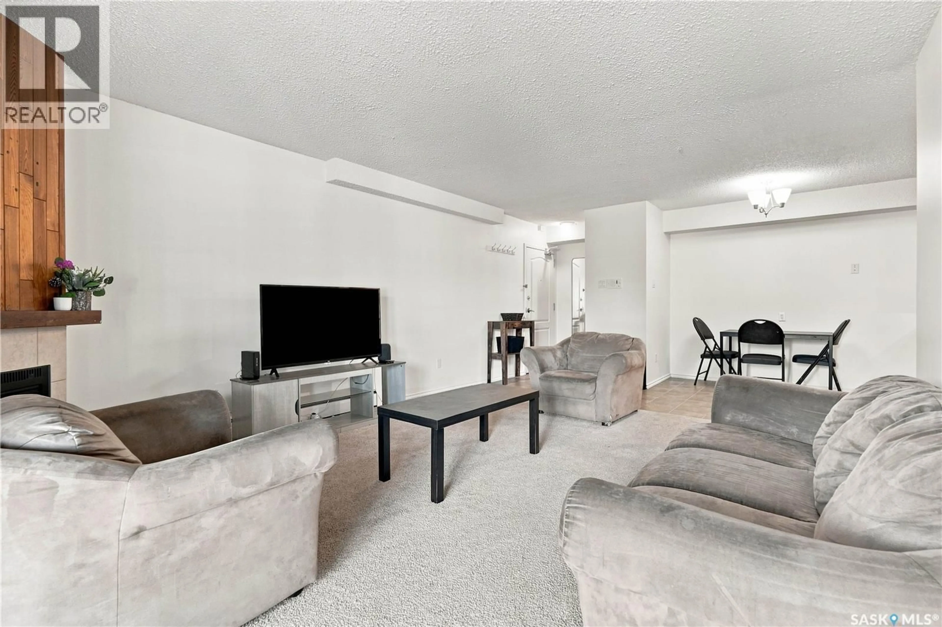 Living room with furniture, unknown for 108G - 1121 MCKERCHER DRIVE, Saskatoon Saskatchewan S7H5B8