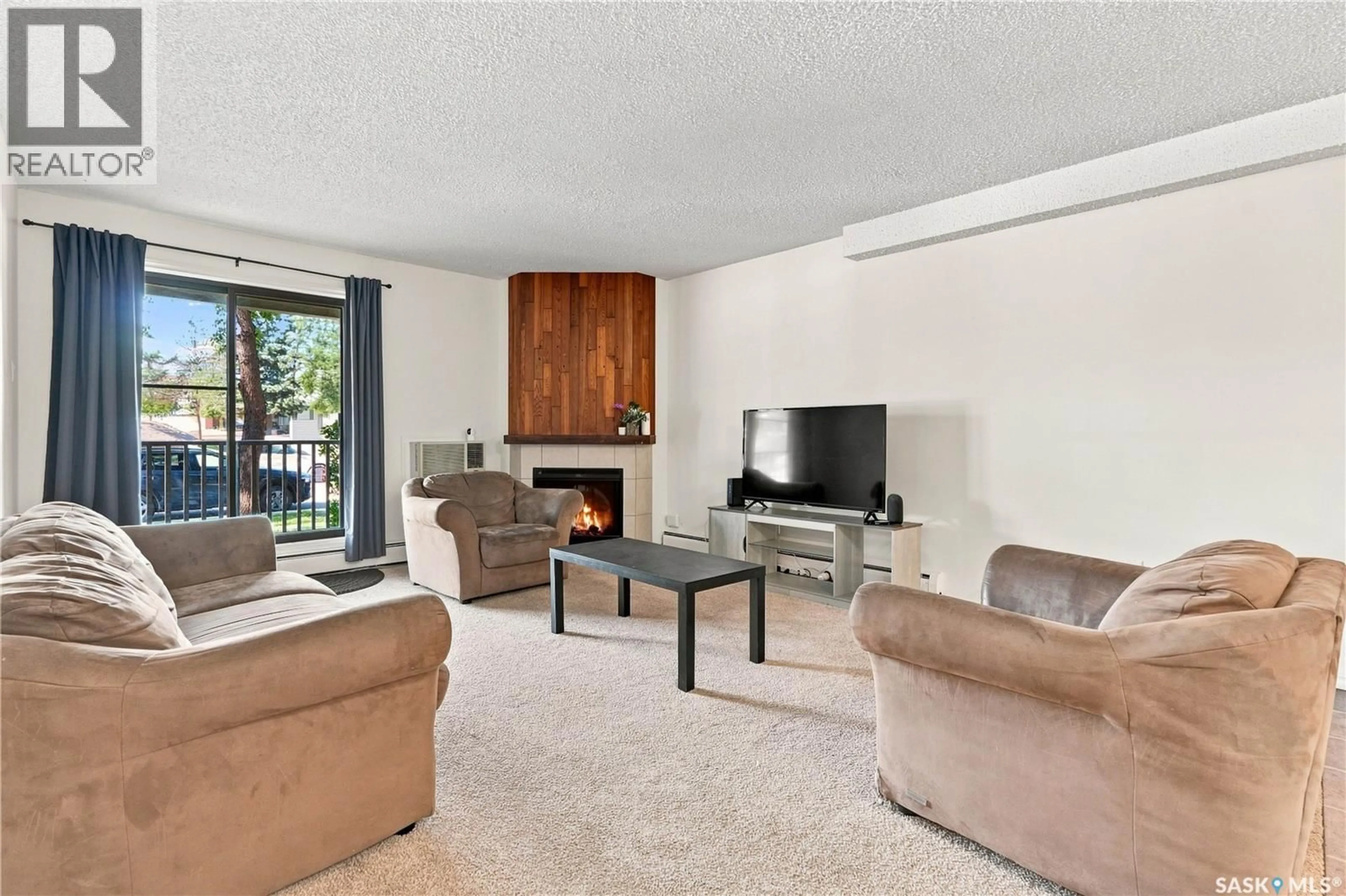 Living room with furniture, unknown for 108G - 1121 MCKERCHER DRIVE, Saskatoon Saskatchewan S7H5B8