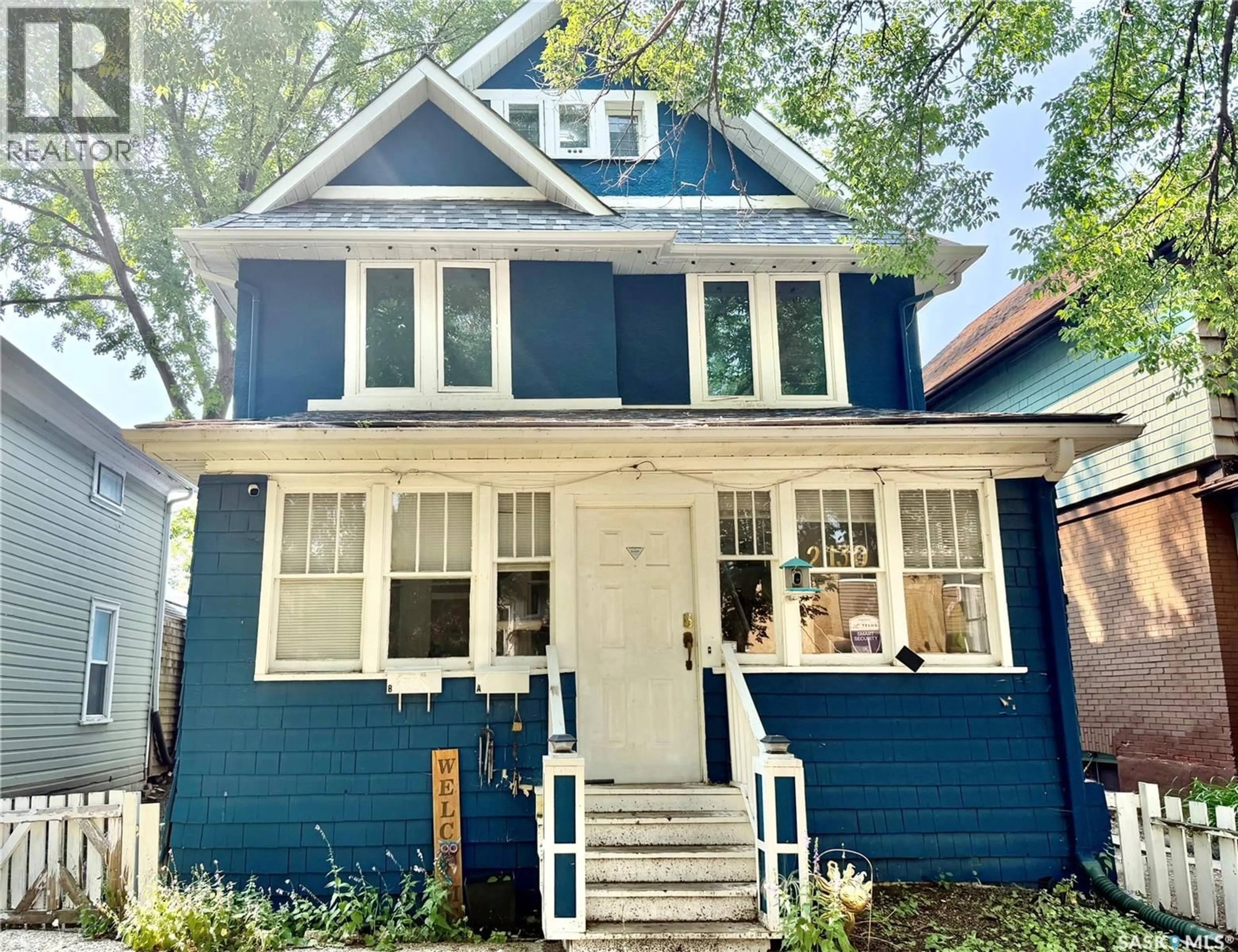 Home with vinyl exterior material, street for 2130 RAE STREET, Regina Saskatchewan S4T2E7