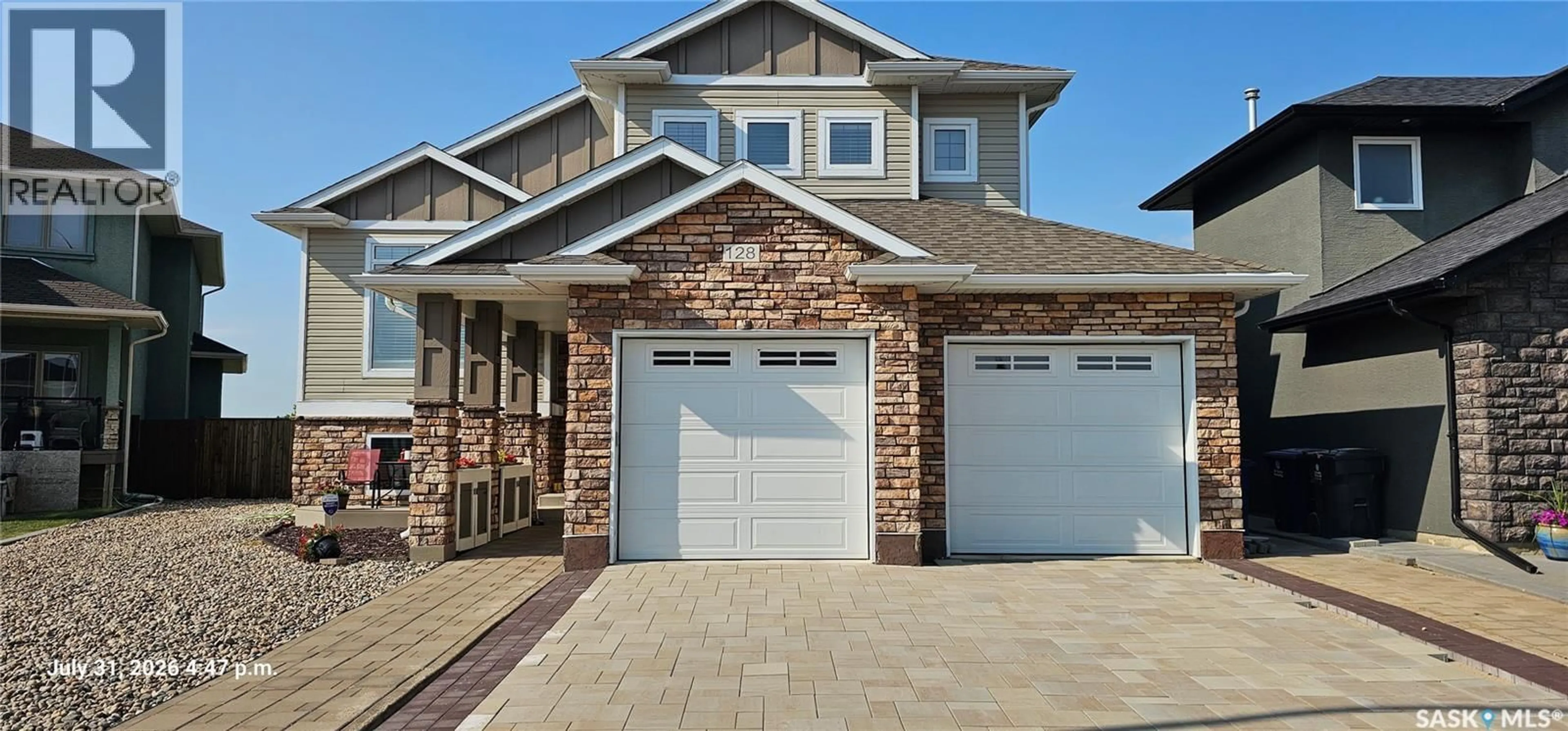 Home with brick exterior material, street for 128 KINSMEN CRESCENT, Martensville Saskatchewan S0K0A2