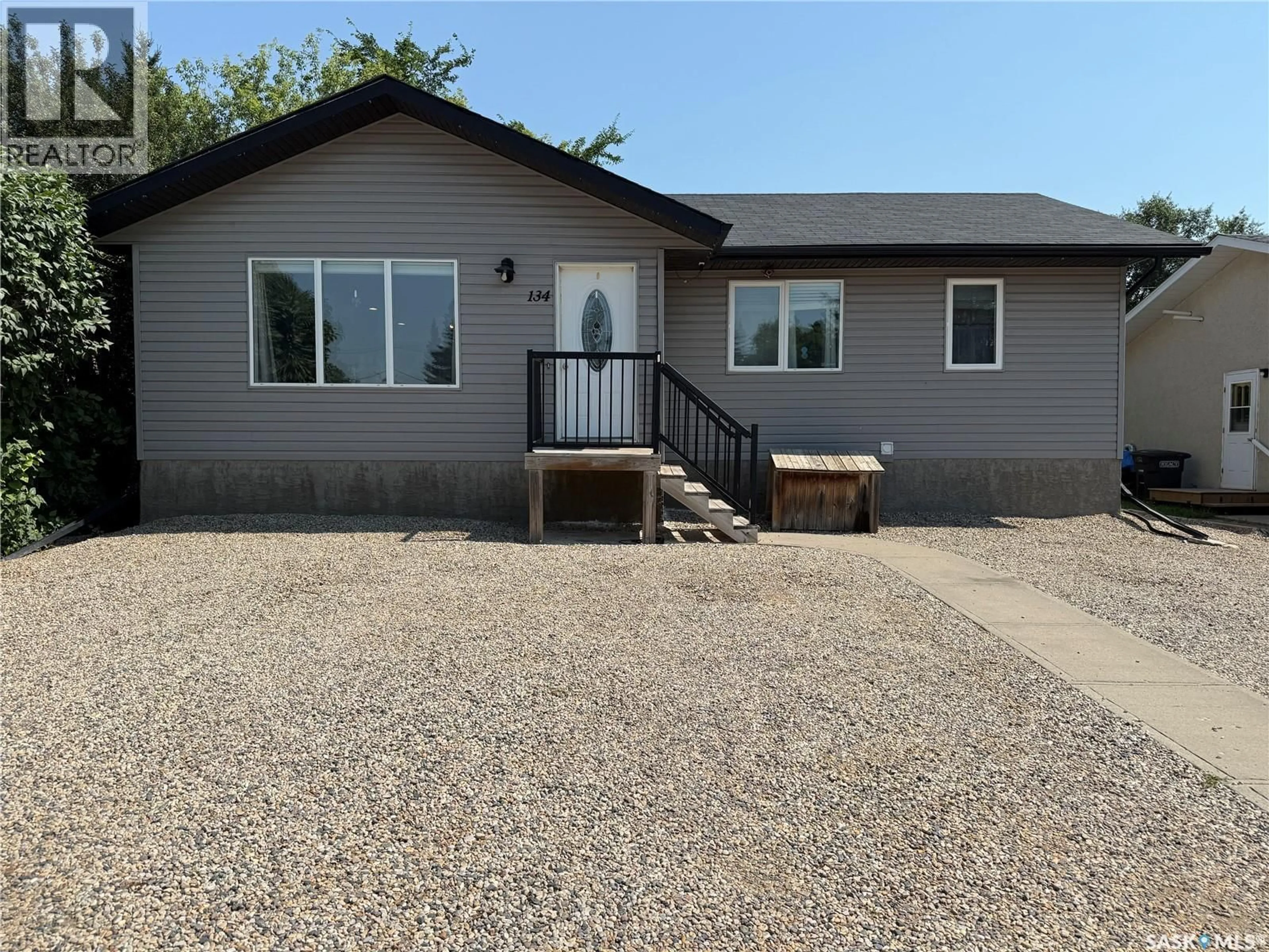 Home with vinyl exterior material, street for 134 10TH STREET, Humboldt Saskatchewan S0K2A0