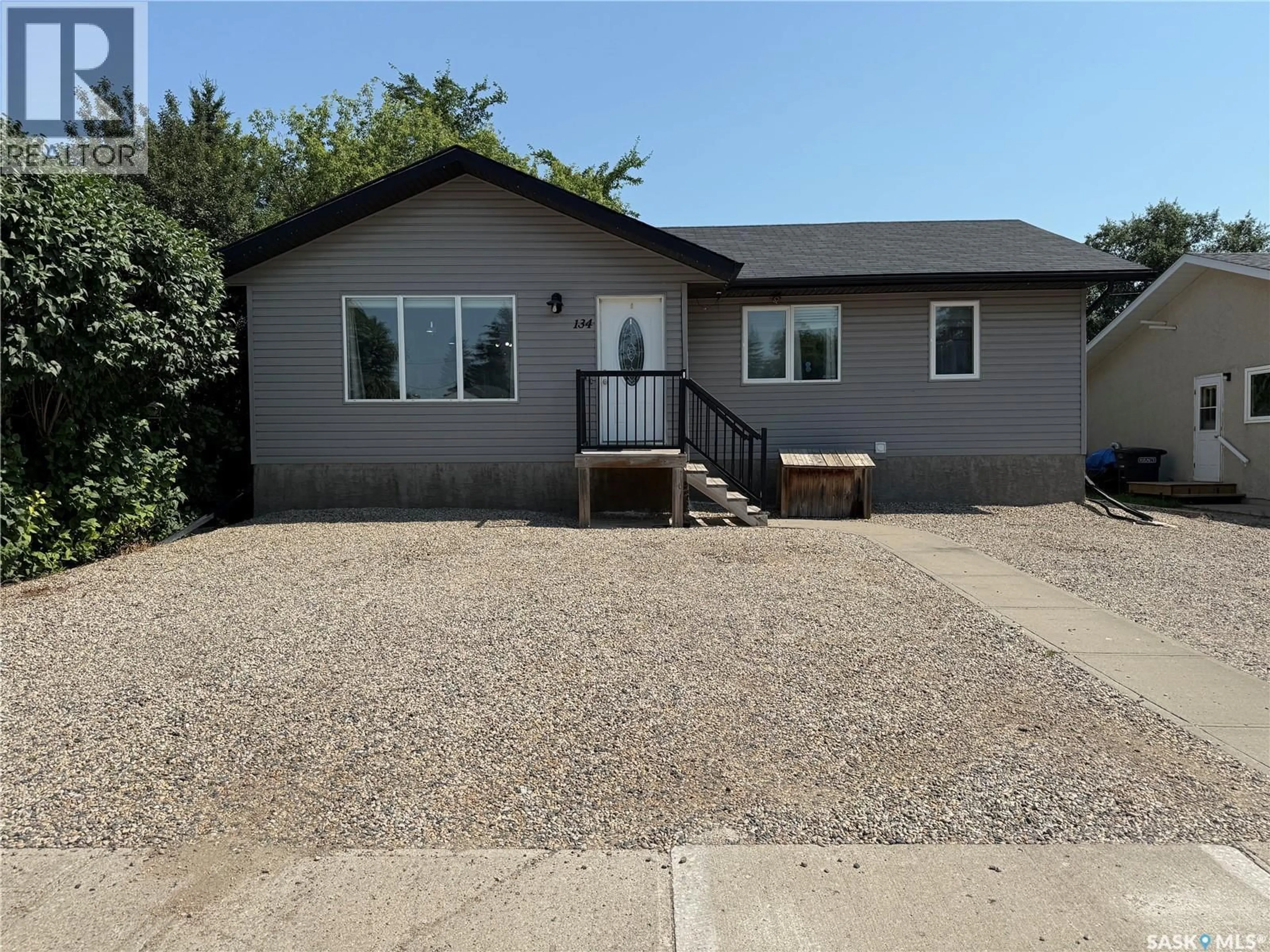 Home with vinyl exterior material, street for 134 10TH STREET, Humboldt Saskatchewan S0K2A0
