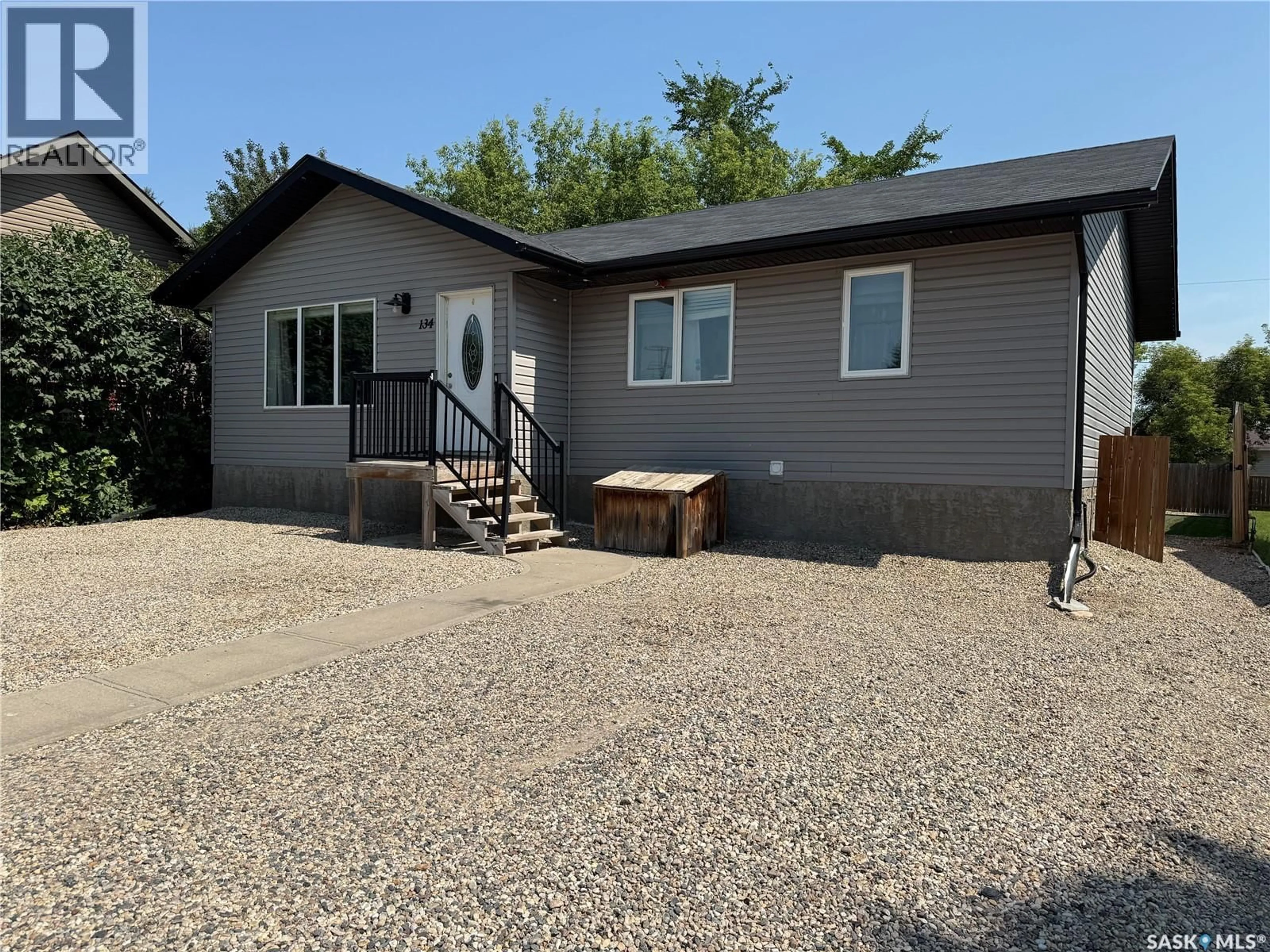 Home with vinyl exterior material, street for 134 10TH STREET, Humboldt Saskatchewan S0K2A0