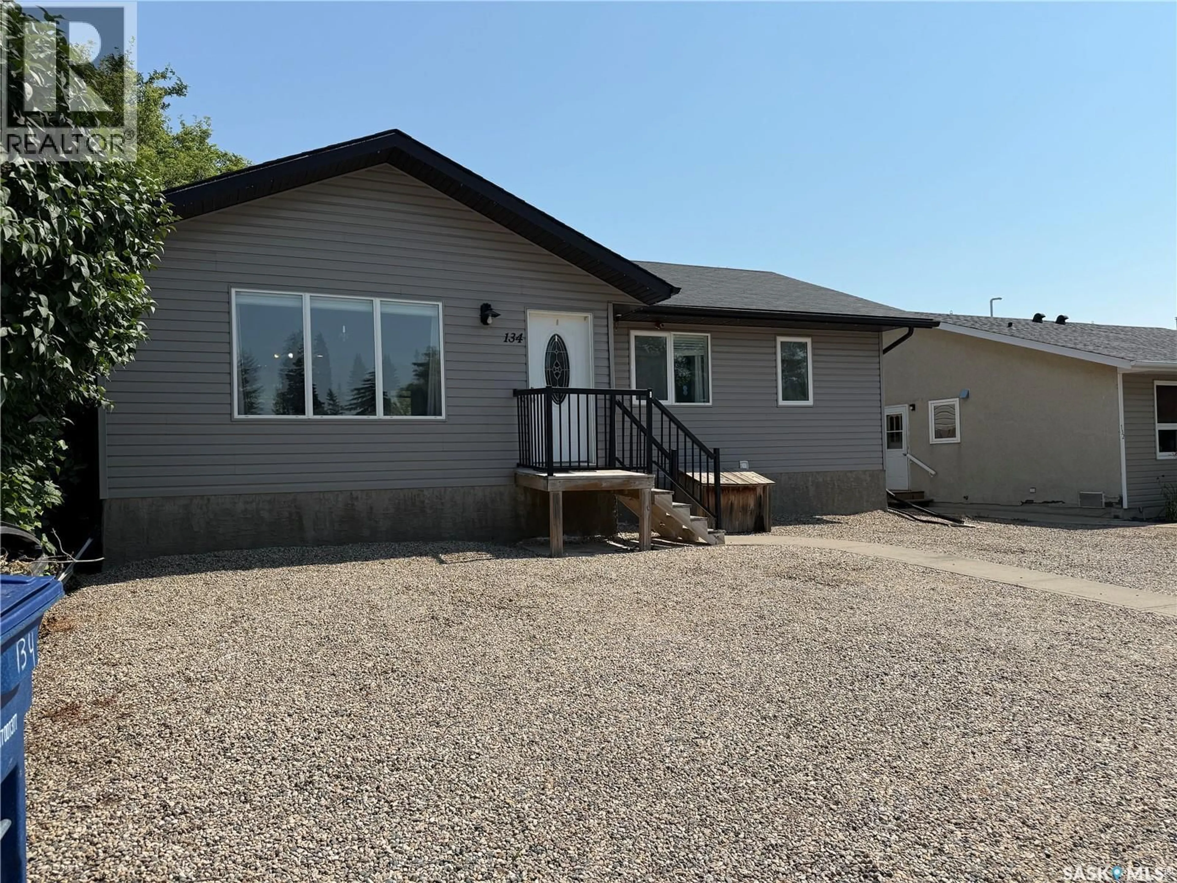 Home with vinyl exterior material, building for 134 10TH STREET, Humboldt Saskatchewan S0K2A0
