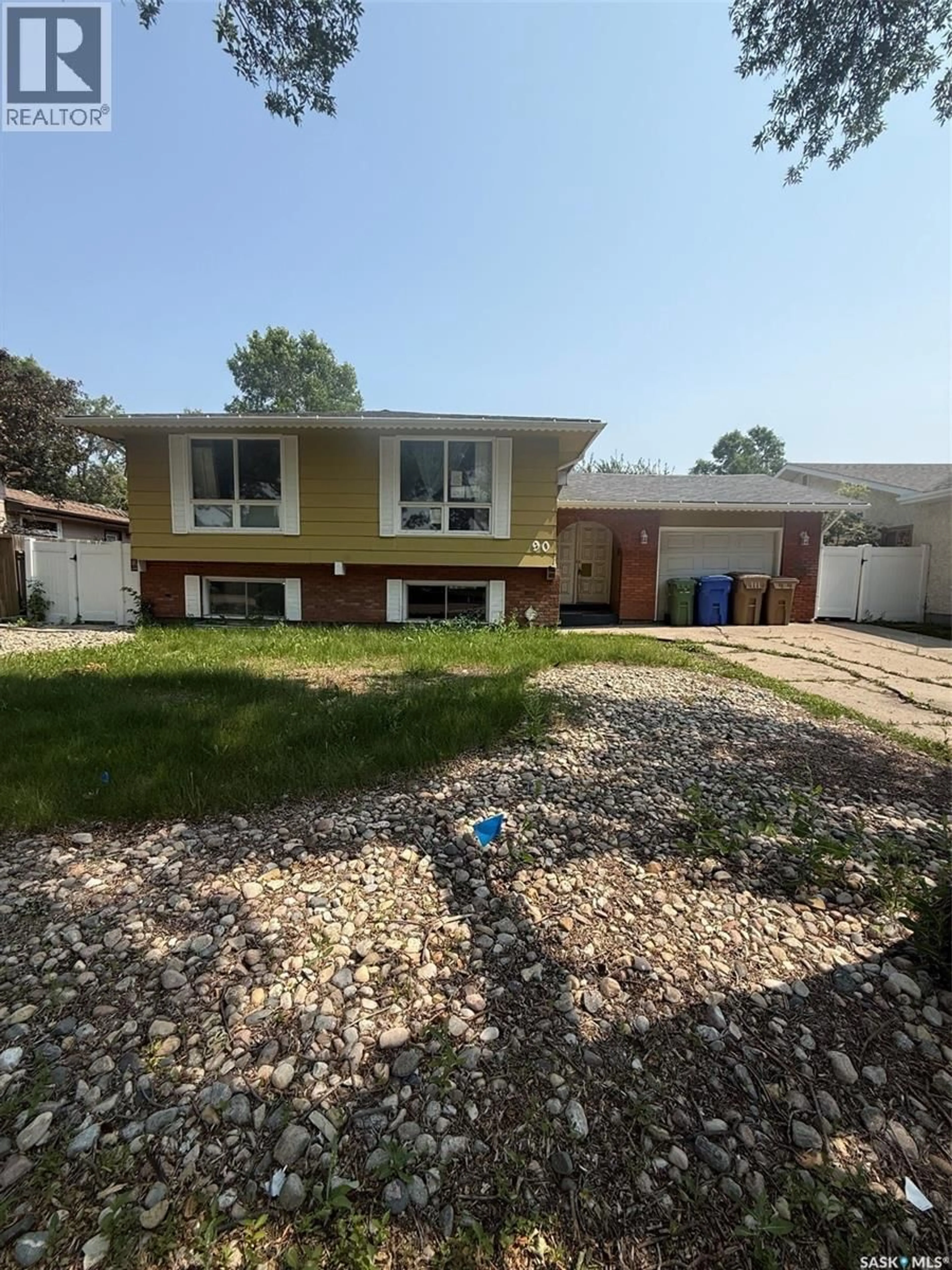 Home with vinyl exterior material, street for 90 MARQUIS CRESCENT, Regina Saskatchewan S4S6J9