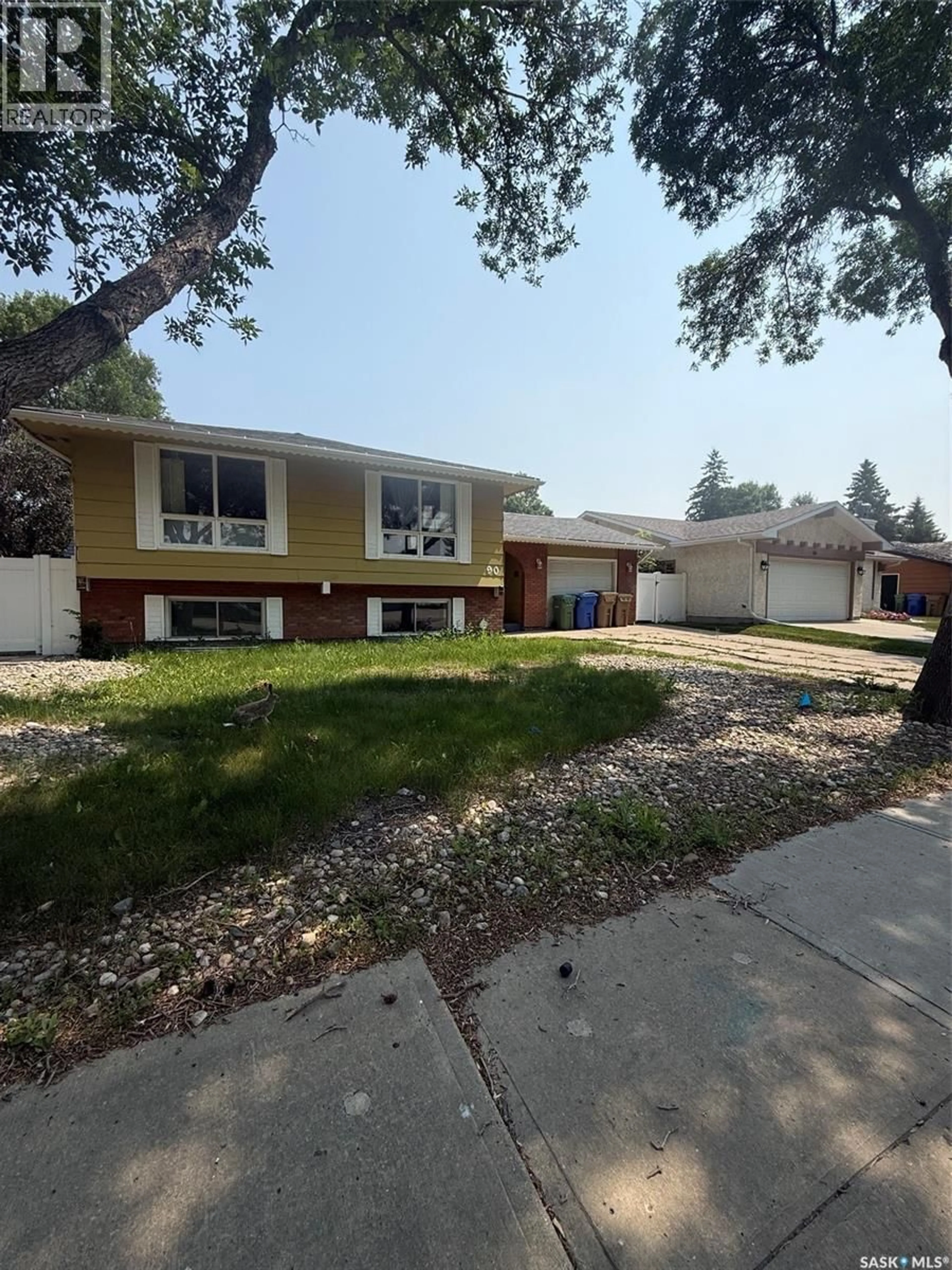 Home with vinyl exterior material, street for 90 MARQUIS CRESCENT, Regina Saskatchewan S4S6J9