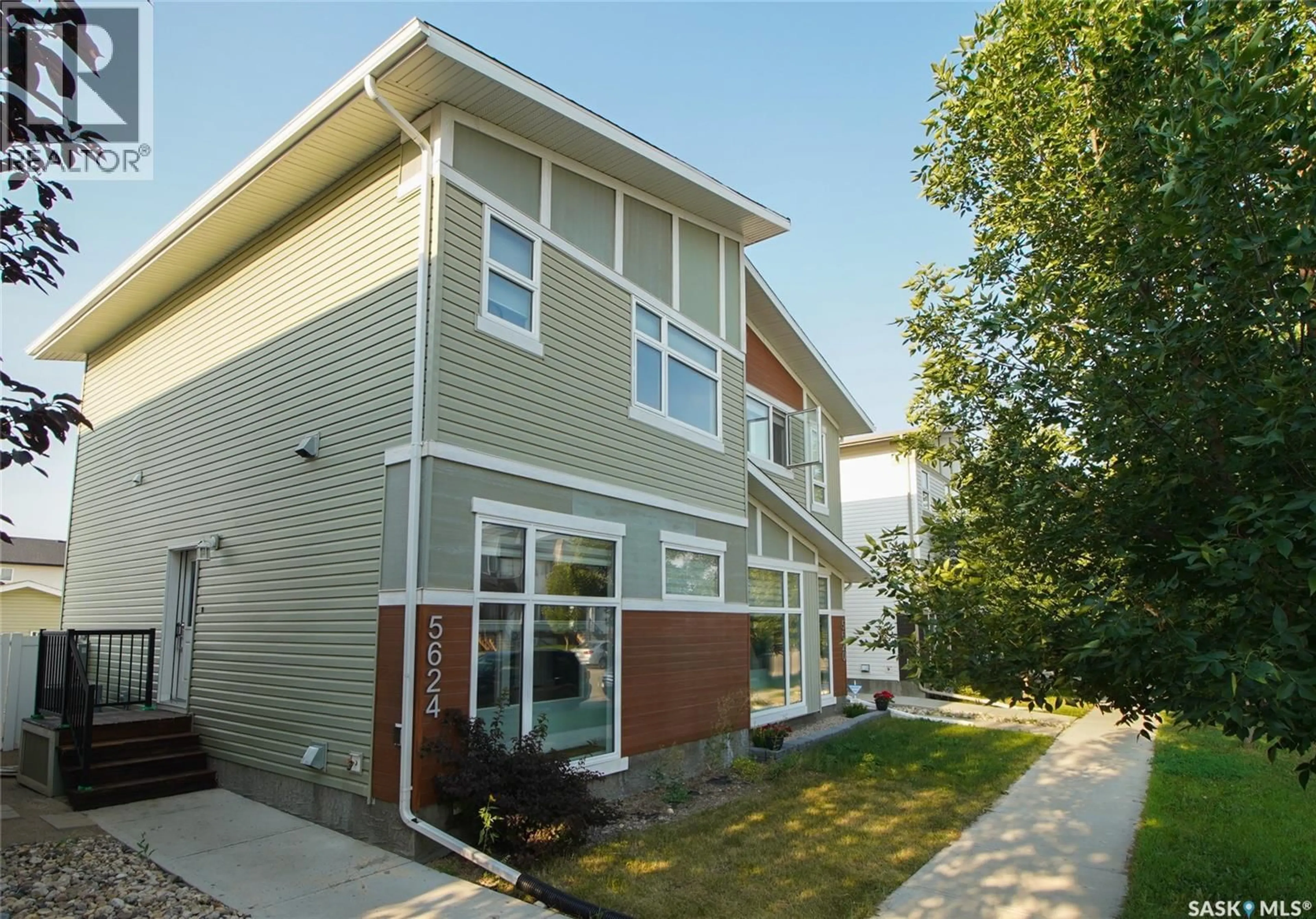 Home with vinyl exterior material, street for 5624 TUTOR WAY, Regina Saskatchewan S4W0N6