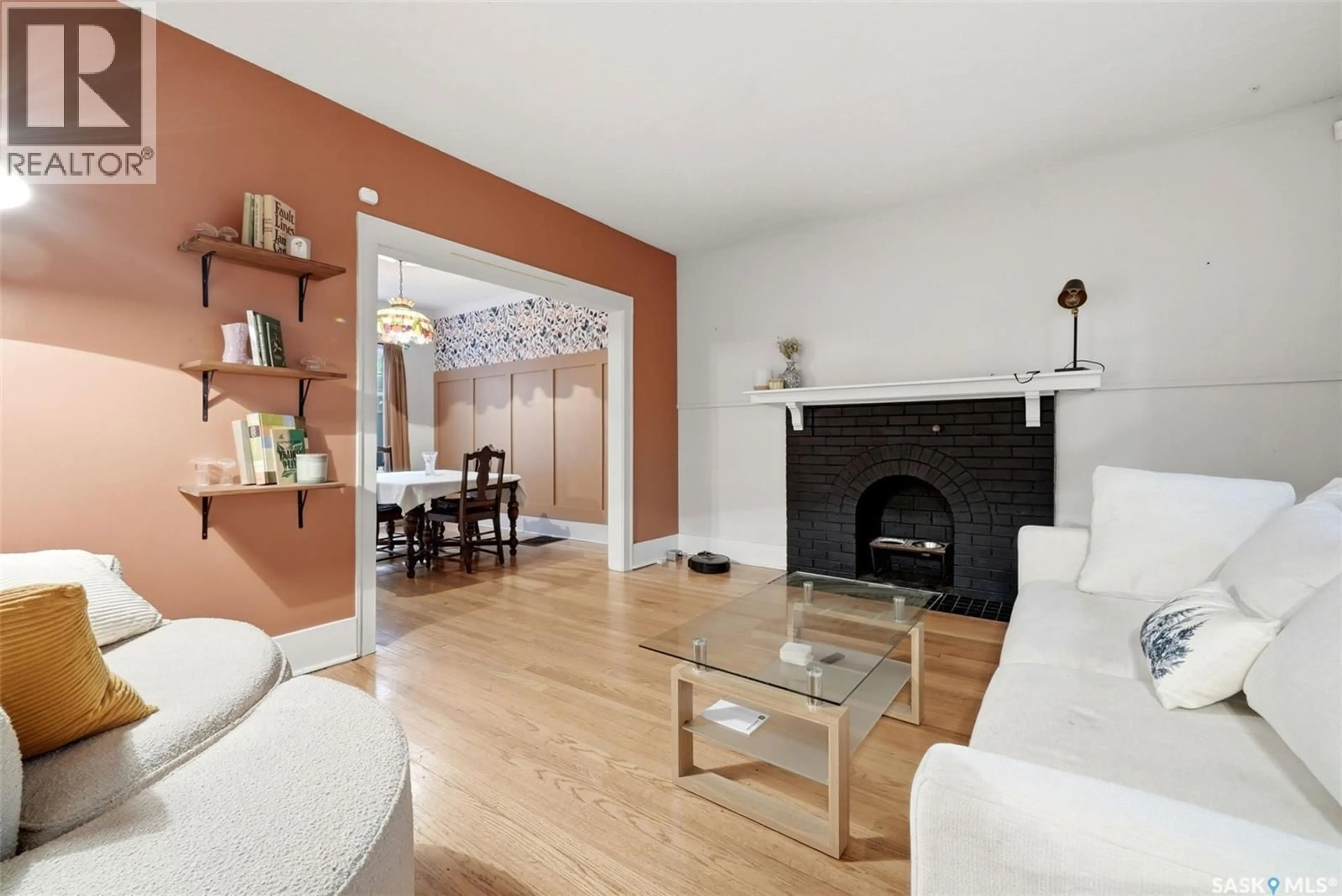 Living room with furniture, wood/laminate floor for 2273 CAMERON STREET, Regina Saskatchewan S4T2V9
