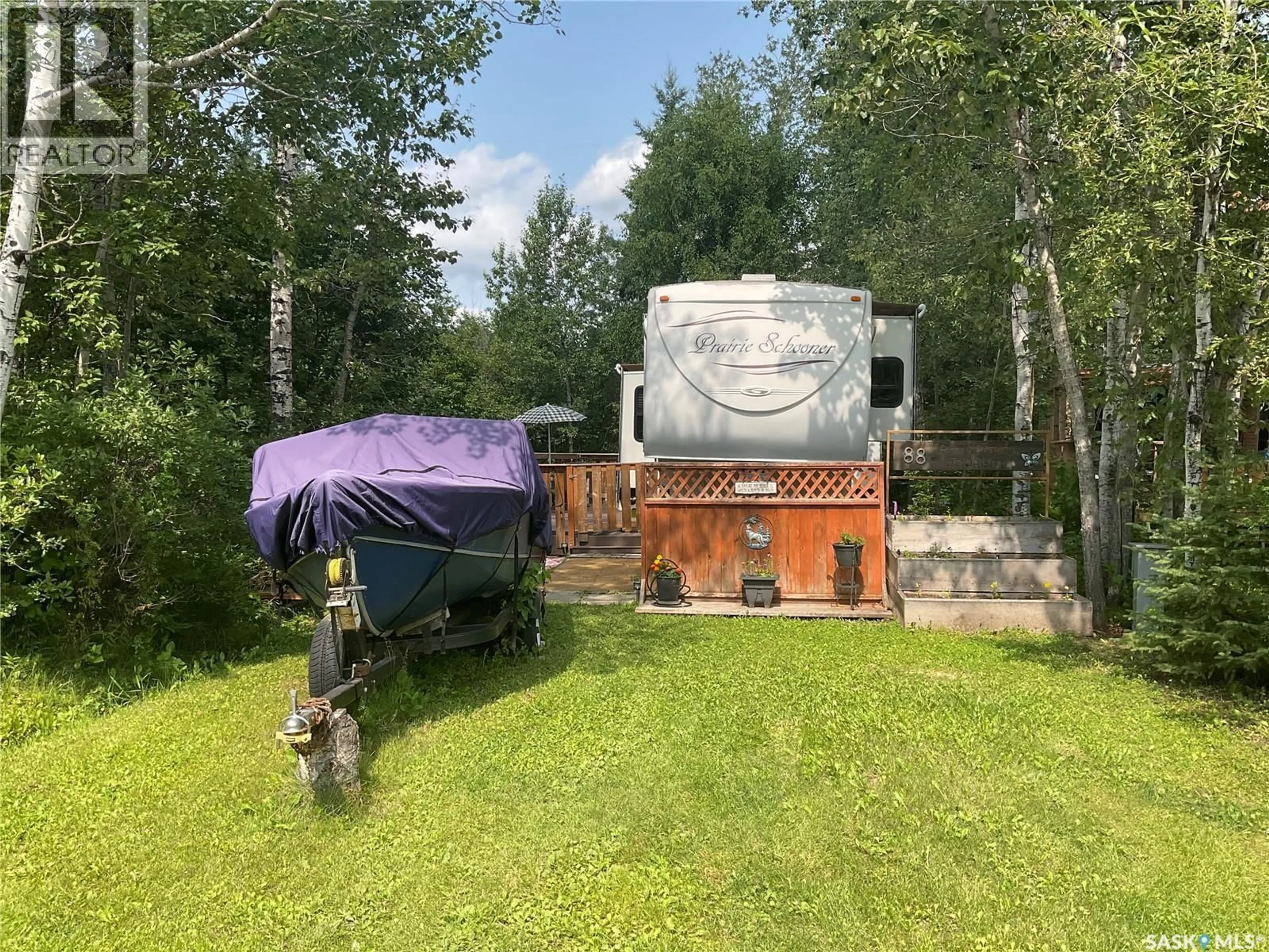 A pic from outside/outdoor area/front of a property/back of a property/a pic from drone, forest/trees view for 88 124 AMBROSE LANE, Lakeland Rm No. 521 Saskatchewan S0J0N0