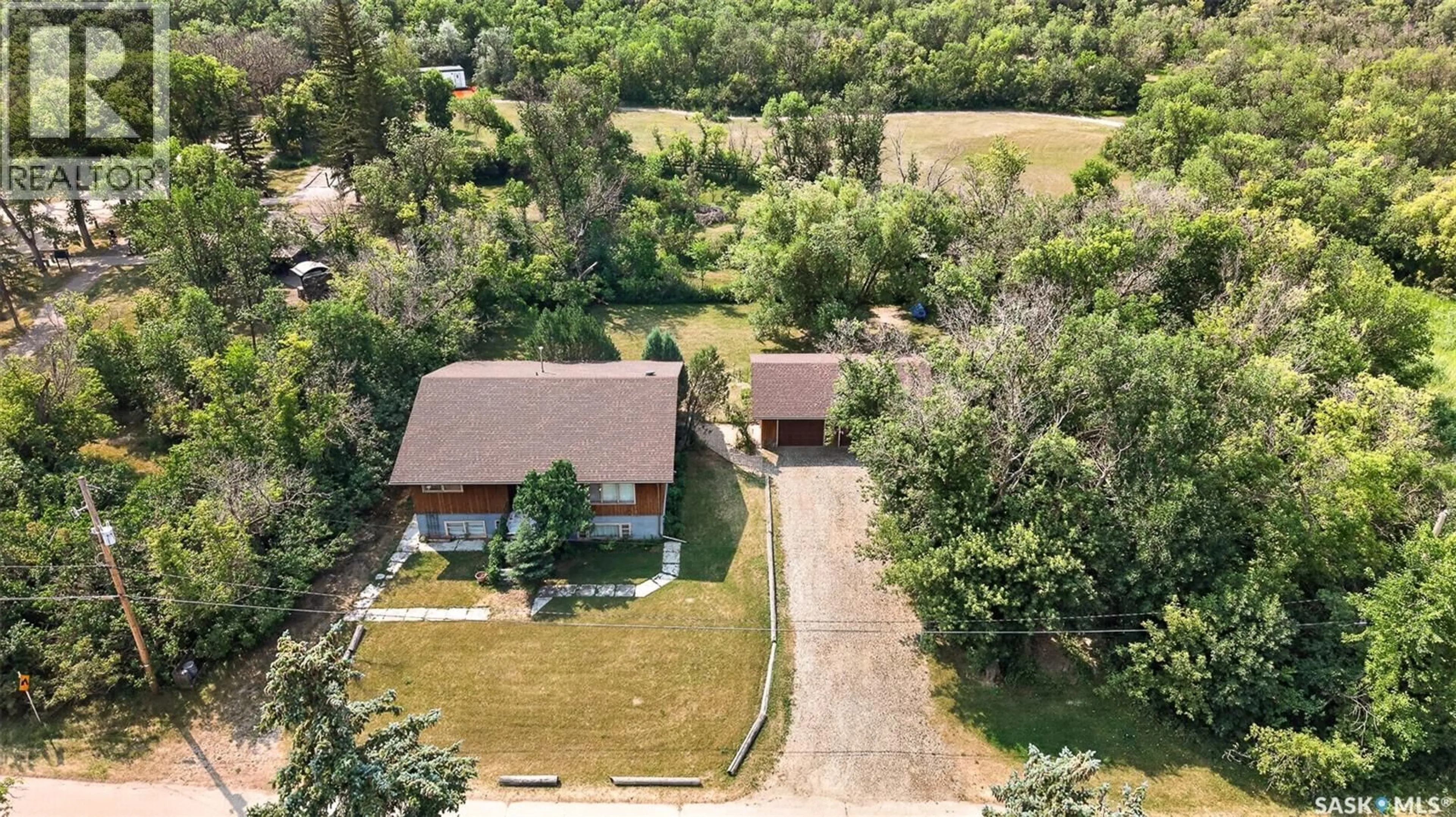 A pic from outside/outdoor area/front of a property/back of a property/a pic from drone, street for 347 WELLESLEY STREET, Moose Jaw Saskatchewan S6H6A2