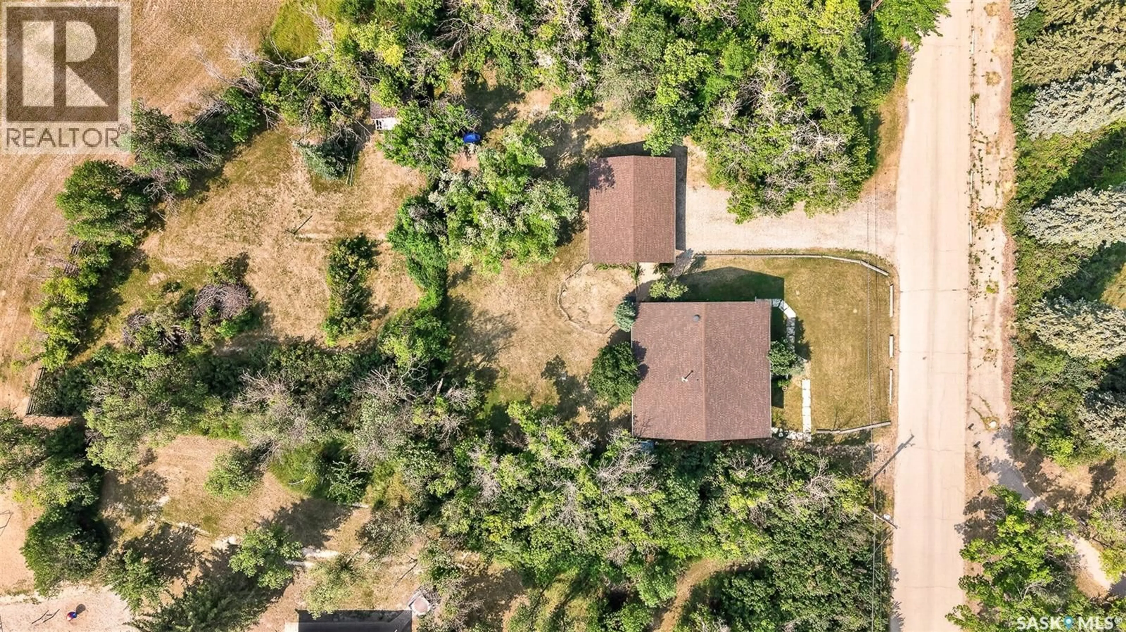 A pic from outside/outdoor area/front of a property/back of a property/a pic from drone, forest/trees view for 347 WELLESLEY STREET, Moose Jaw Saskatchewan S6H6A2