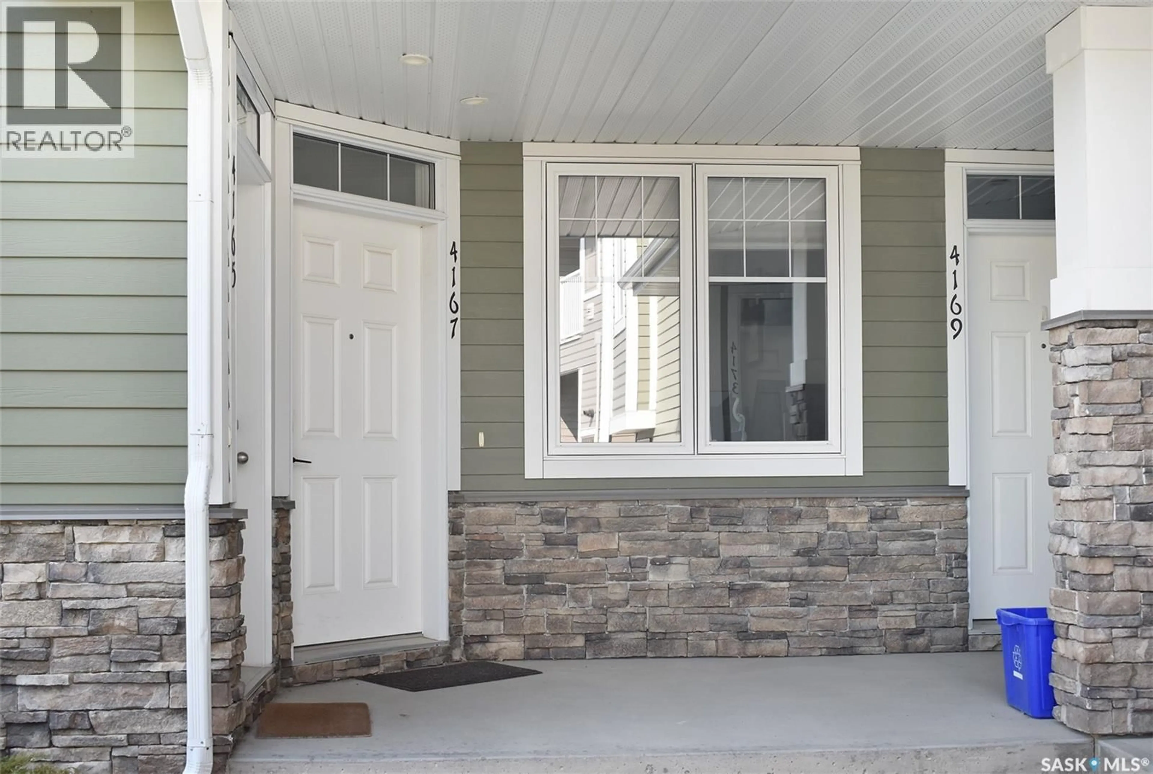 Home with vinyl exterior material, street for 4167 GREEN APPLE DRIVE, Regina Saskatchewan S4V1S1