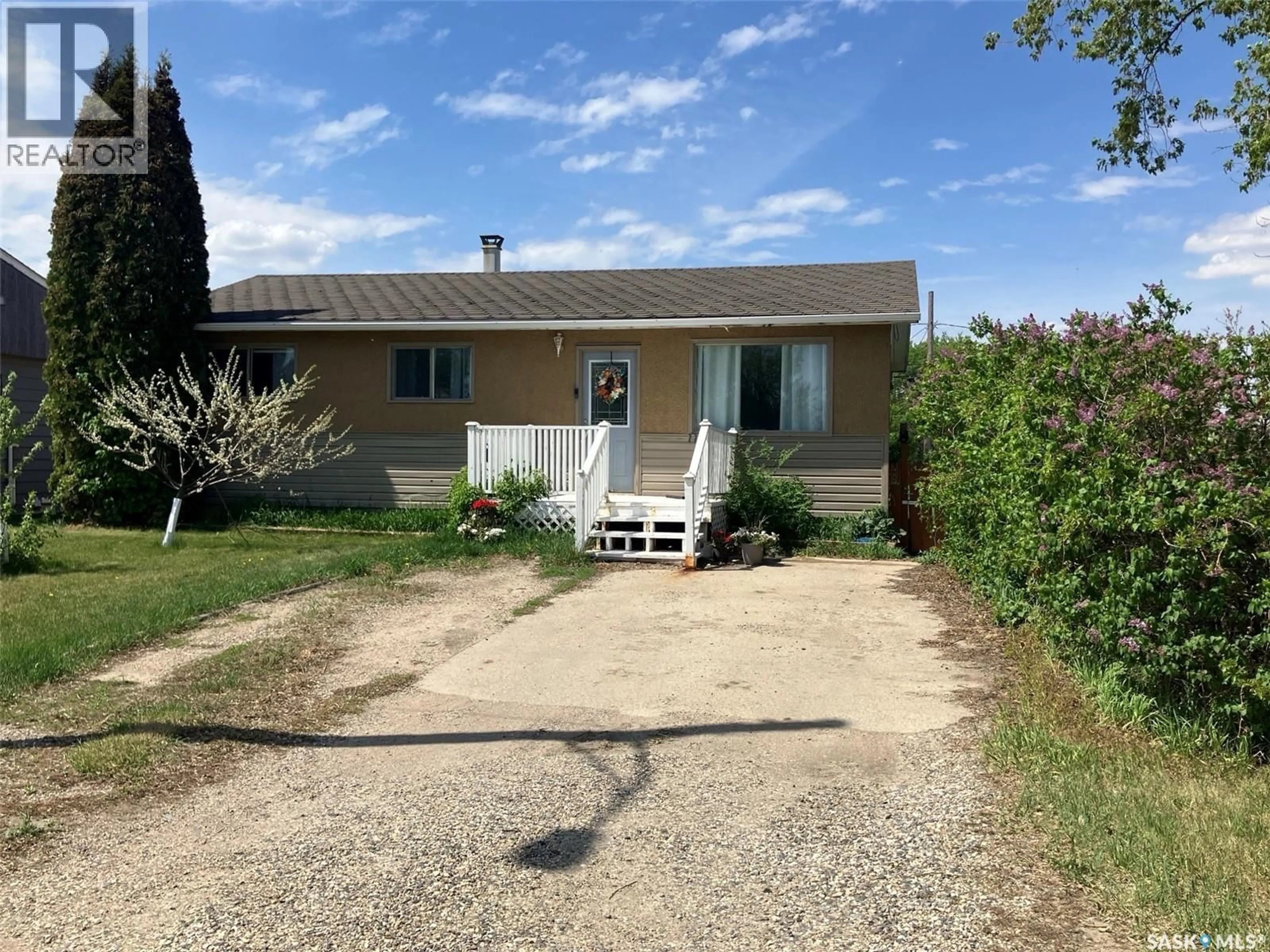 A pic from outside/outdoor area/front of a property/back of a property/a pic from drone, street for 110 4TH STREET, Nipawin Saskatchewan S0E1E0