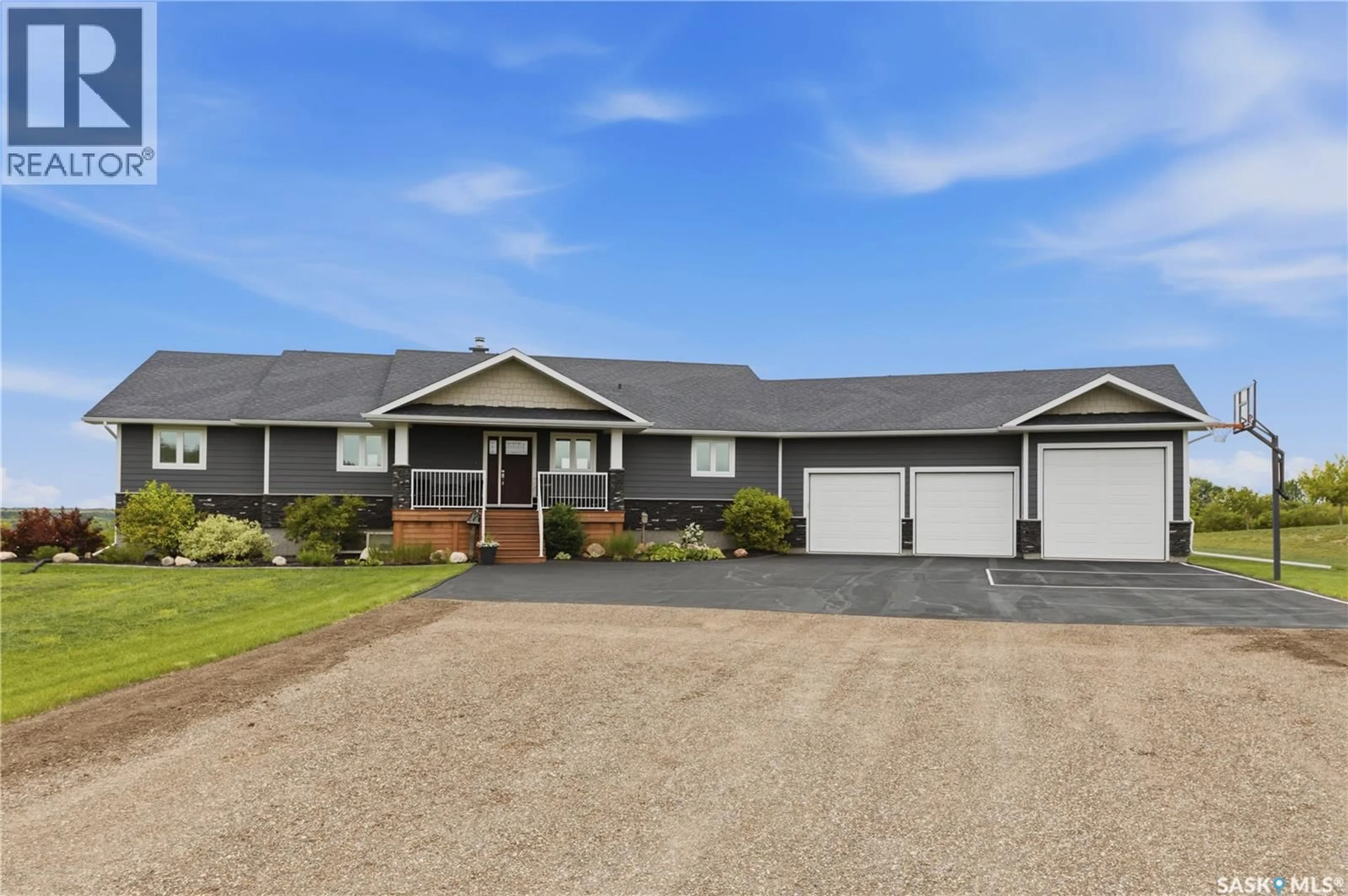Home with vinyl exterior material, street for 12 VALLEY RIDGE ROAD, Last Mountain Lake Saskatchewan S0G0W0