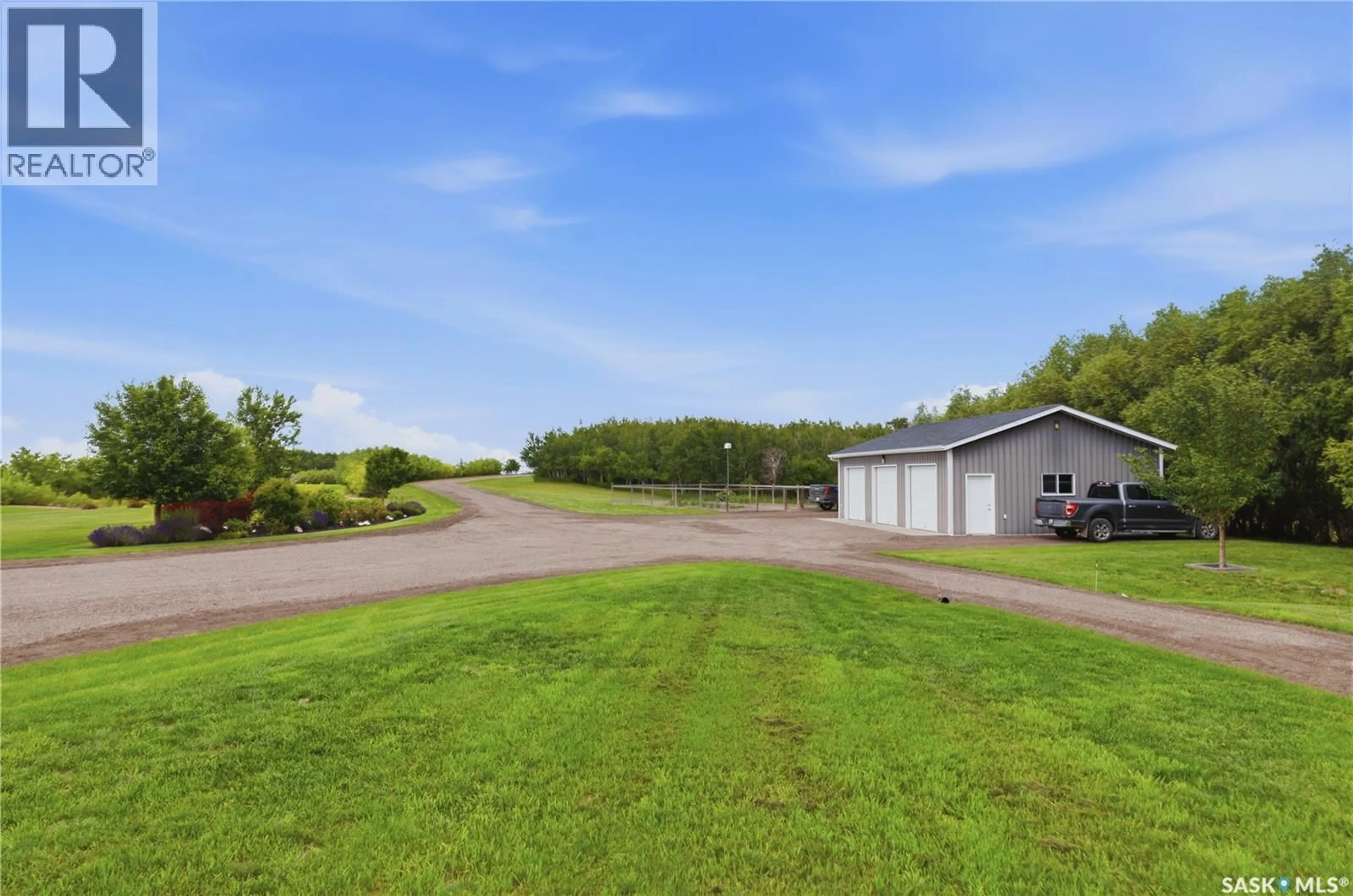 A pic from outside/outdoor area/front of a property/back of a property/a pic from drone, water/lake/river/ocean view for 12 VALLEY RIDGE ROAD, Last Mountain Lake Saskatchewan S0G0W0