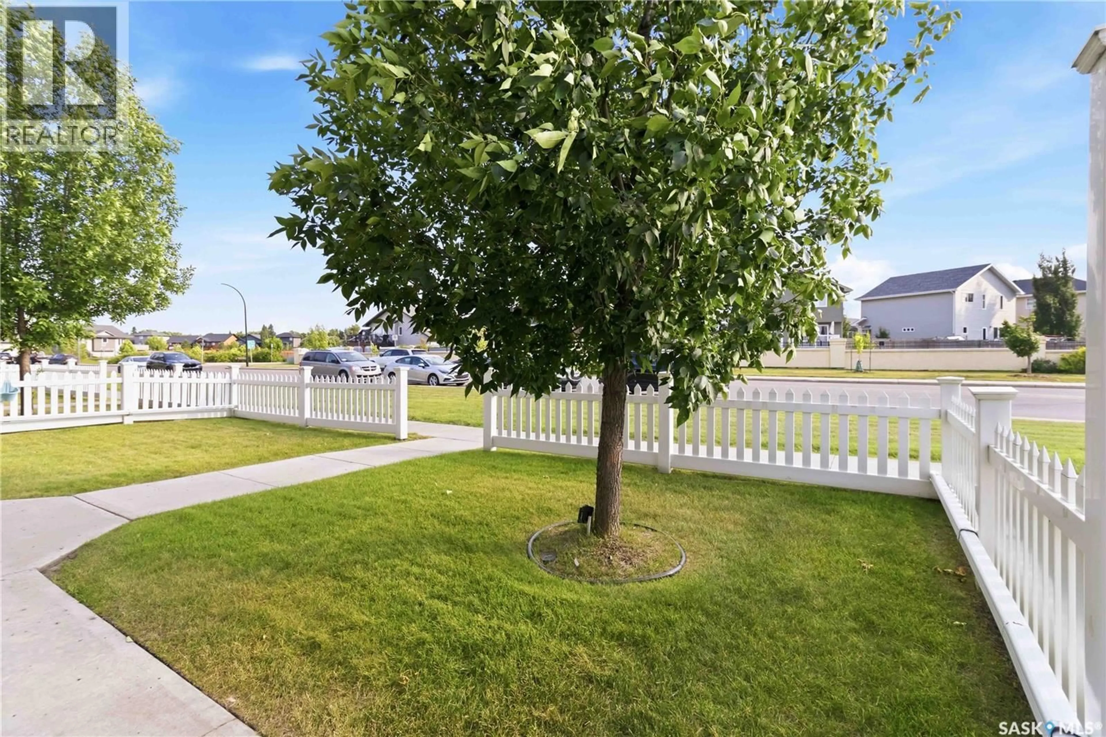A pic from outside/outdoor area/front of a property/back of a property/a pic from drone, street for 1303 - 115 RICHARDSON ROAD, Saskatoon Saskatchewan S7R0L1