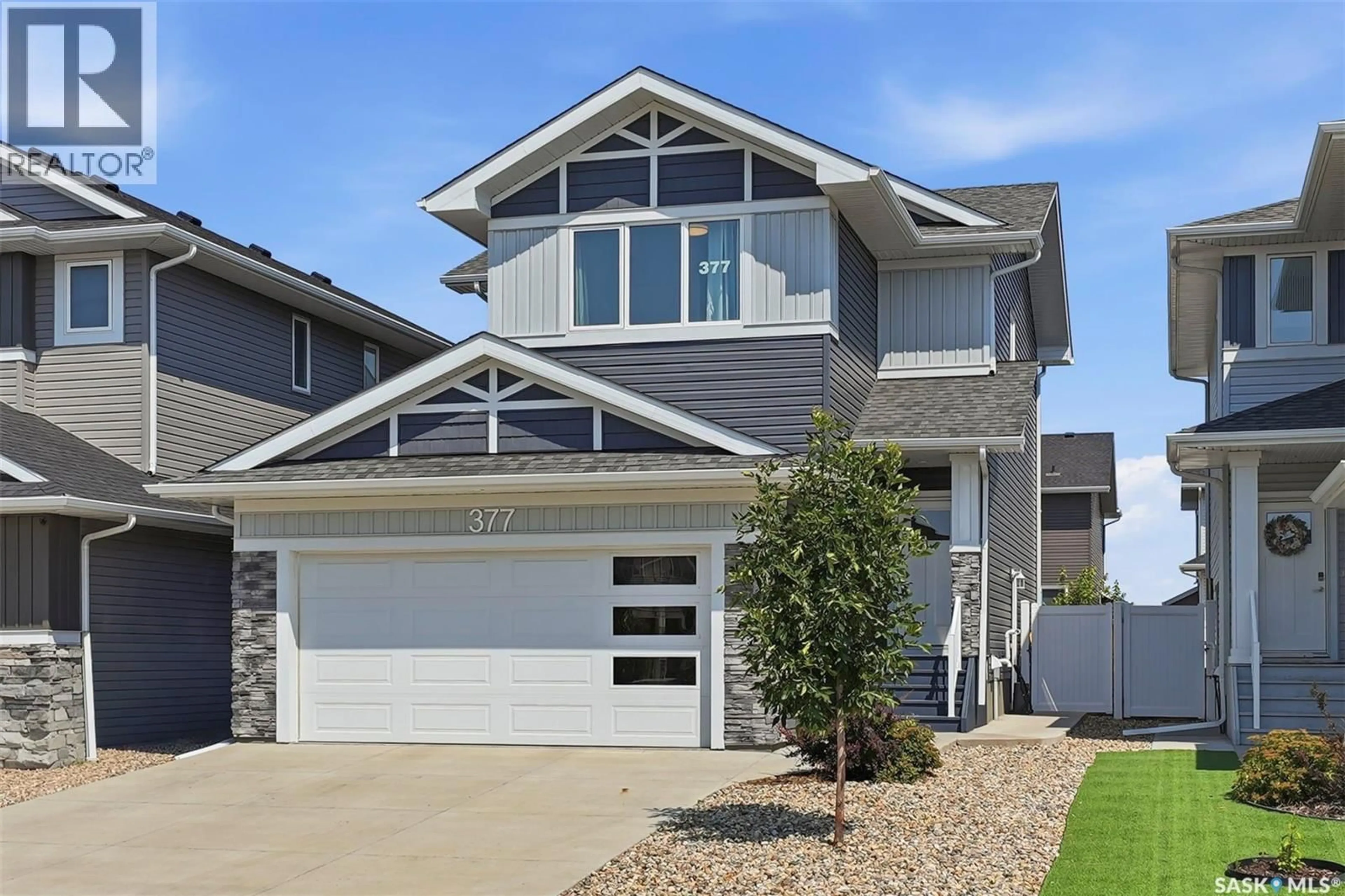 Home with vinyl exterior material, street for 377 GERMAIN MANOR, Saskatoon Saskatchewan S7V0V1