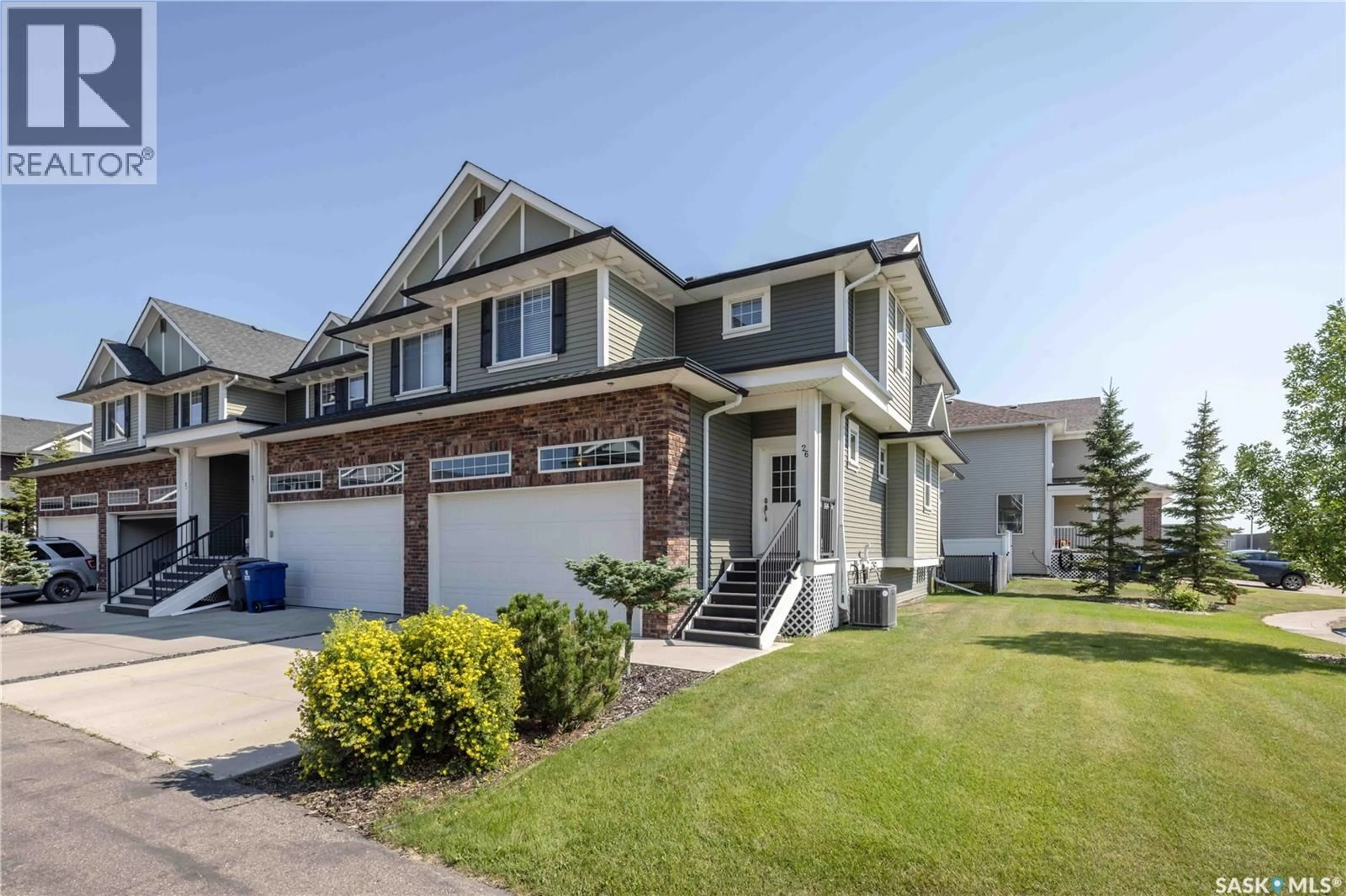 Home with vinyl exterior material, street for 26 425 LANGER PLACE, Warman Saskatchewan S0K4S1
