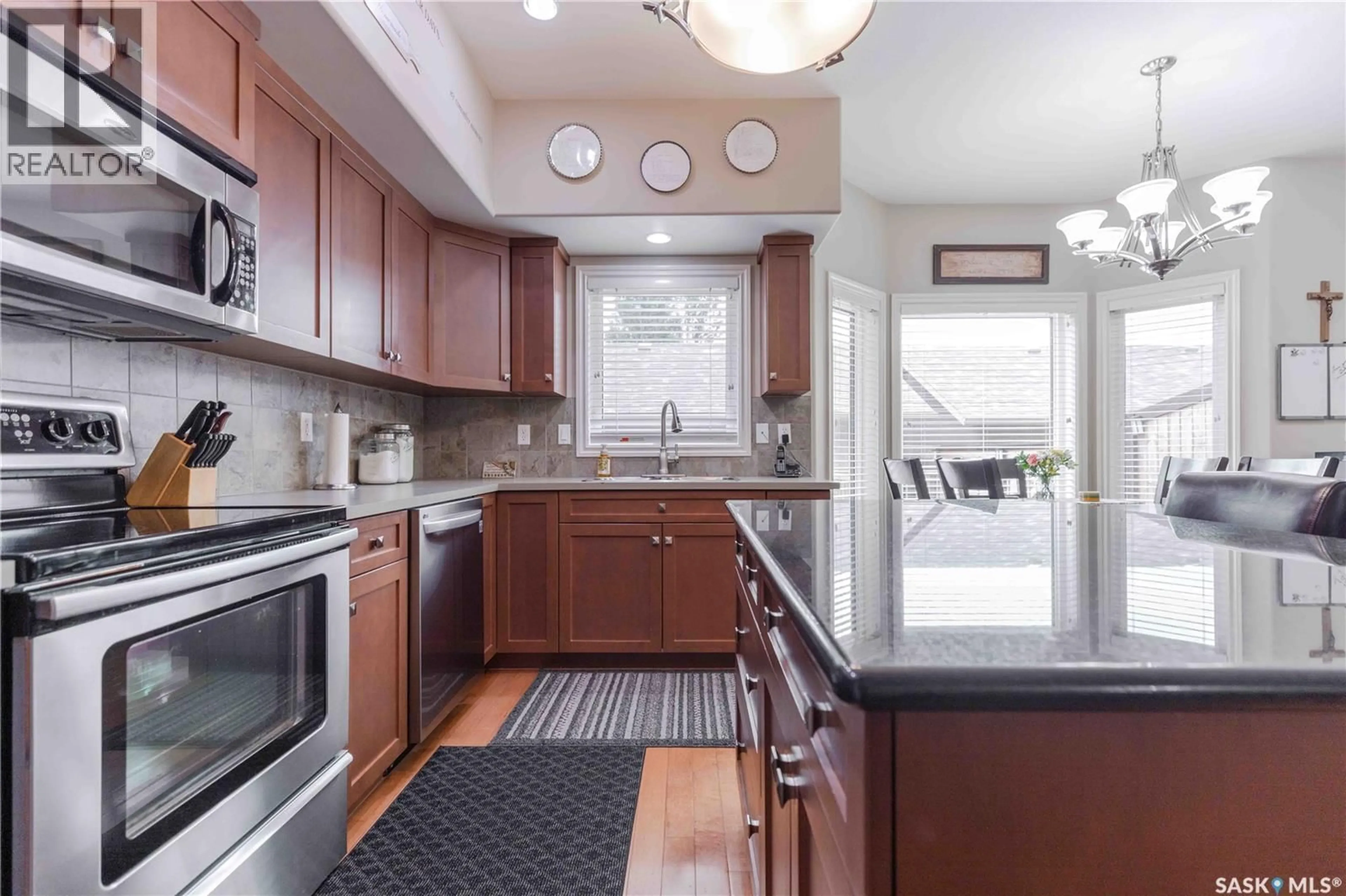 Open concept kitchen, ceramic/tile floor for 107 GALLOWAY ROAD, Saskatoon Saskatchewan S7T0G2