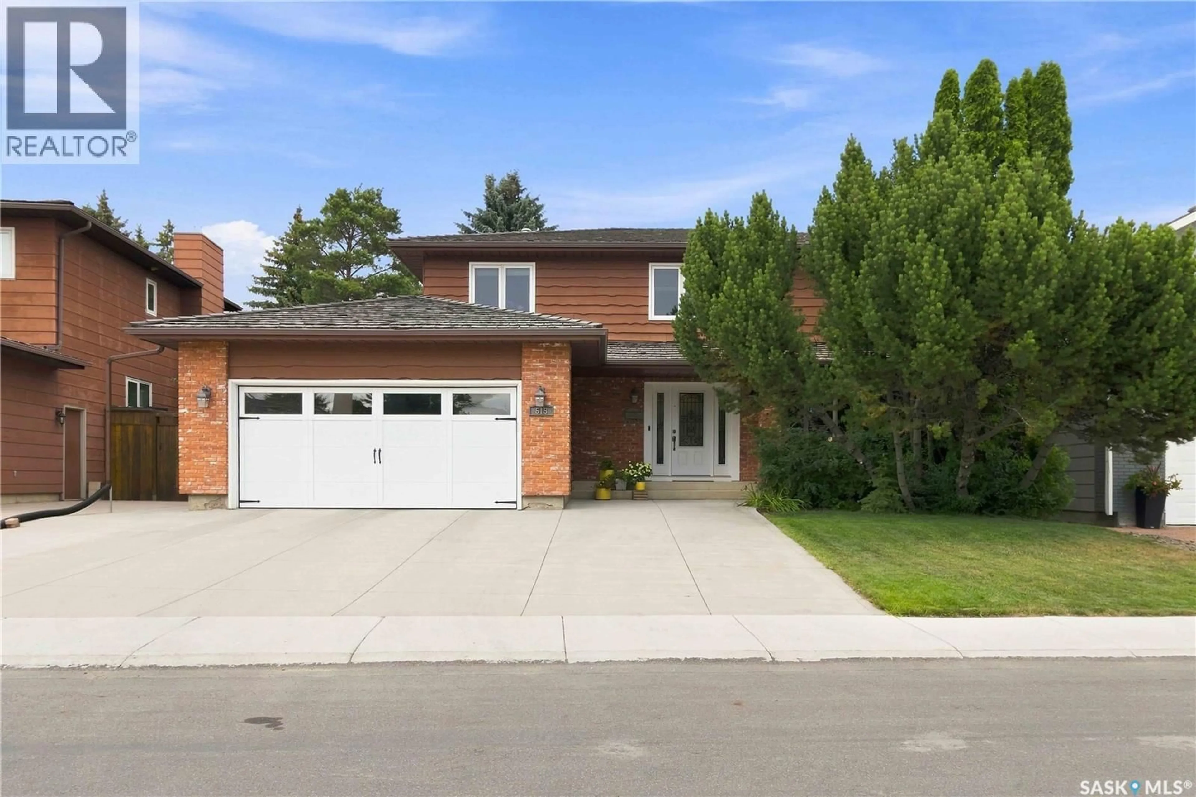 Home with brick exterior material, street for 515 EMERALD PLACE, Saskatoon Saskatchewan S7J4E4