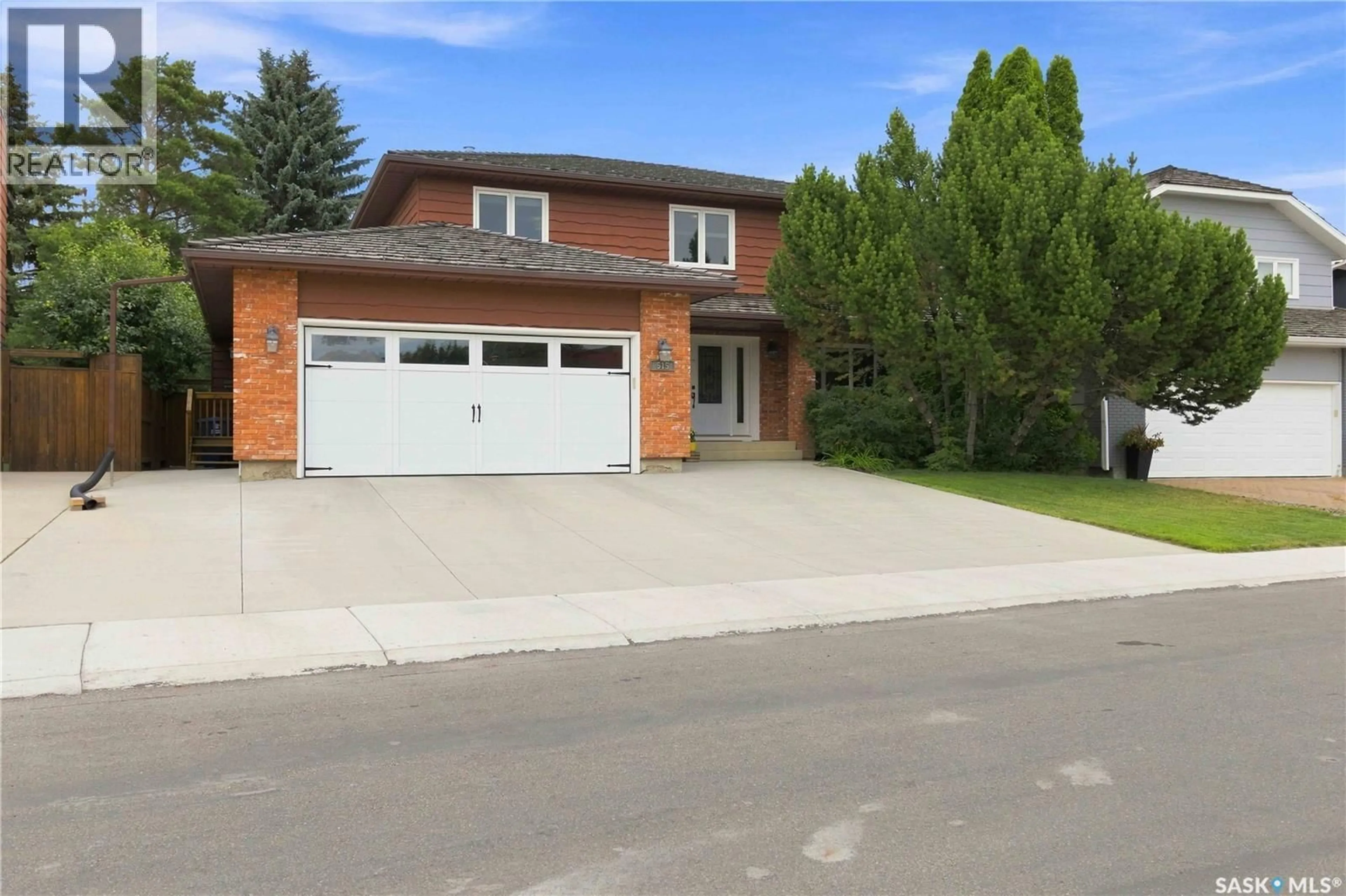 Home with brick exterior material, street for 515 EMERALD PLACE, Saskatoon Saskatchewan S7J4E4