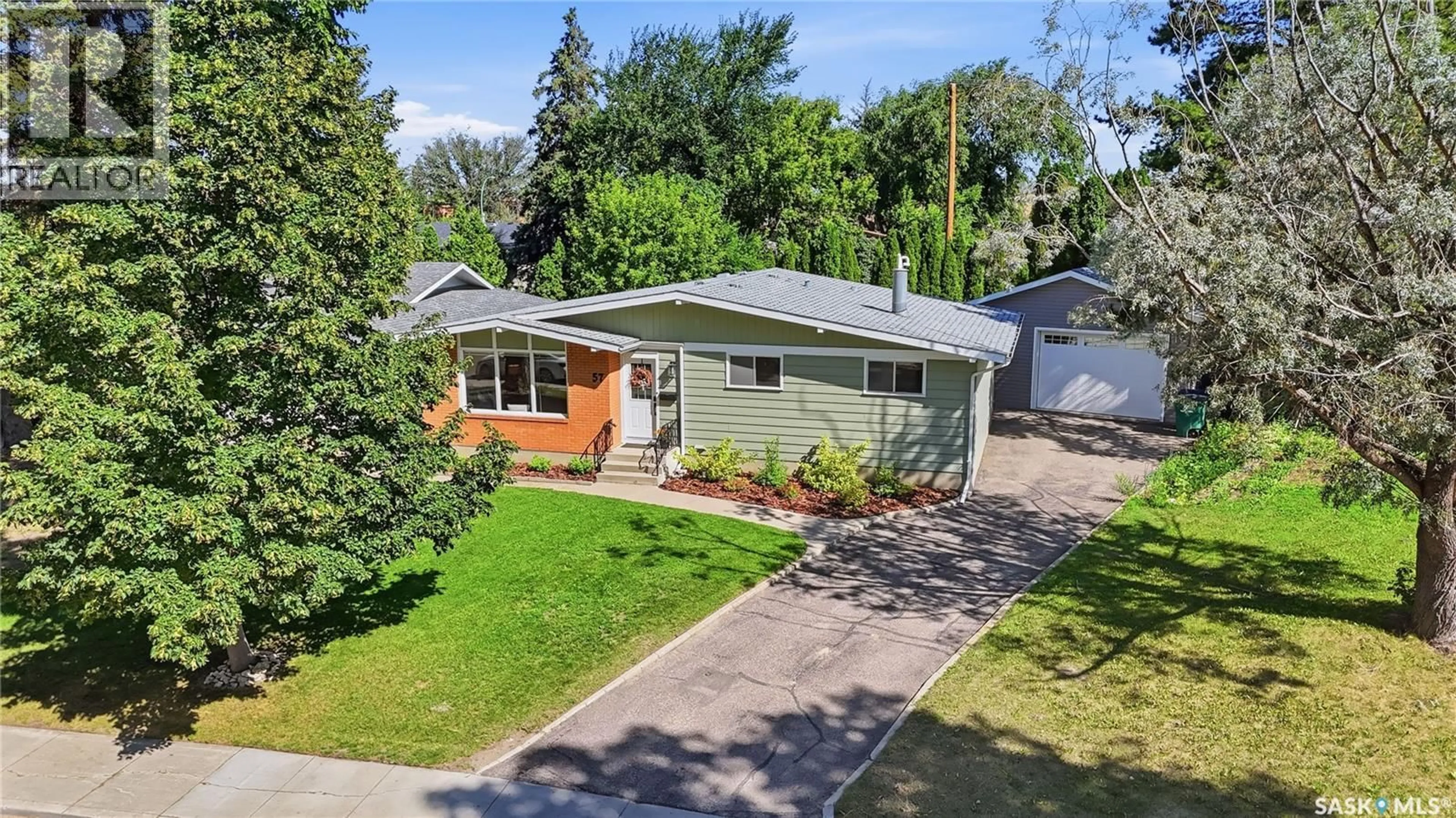 A pic from outside/outdoor area/front of a property/back of a property/a pic from drone, street for 57 POTTER CRESCENT, Saskatoon Saskatchewan S7H3L2