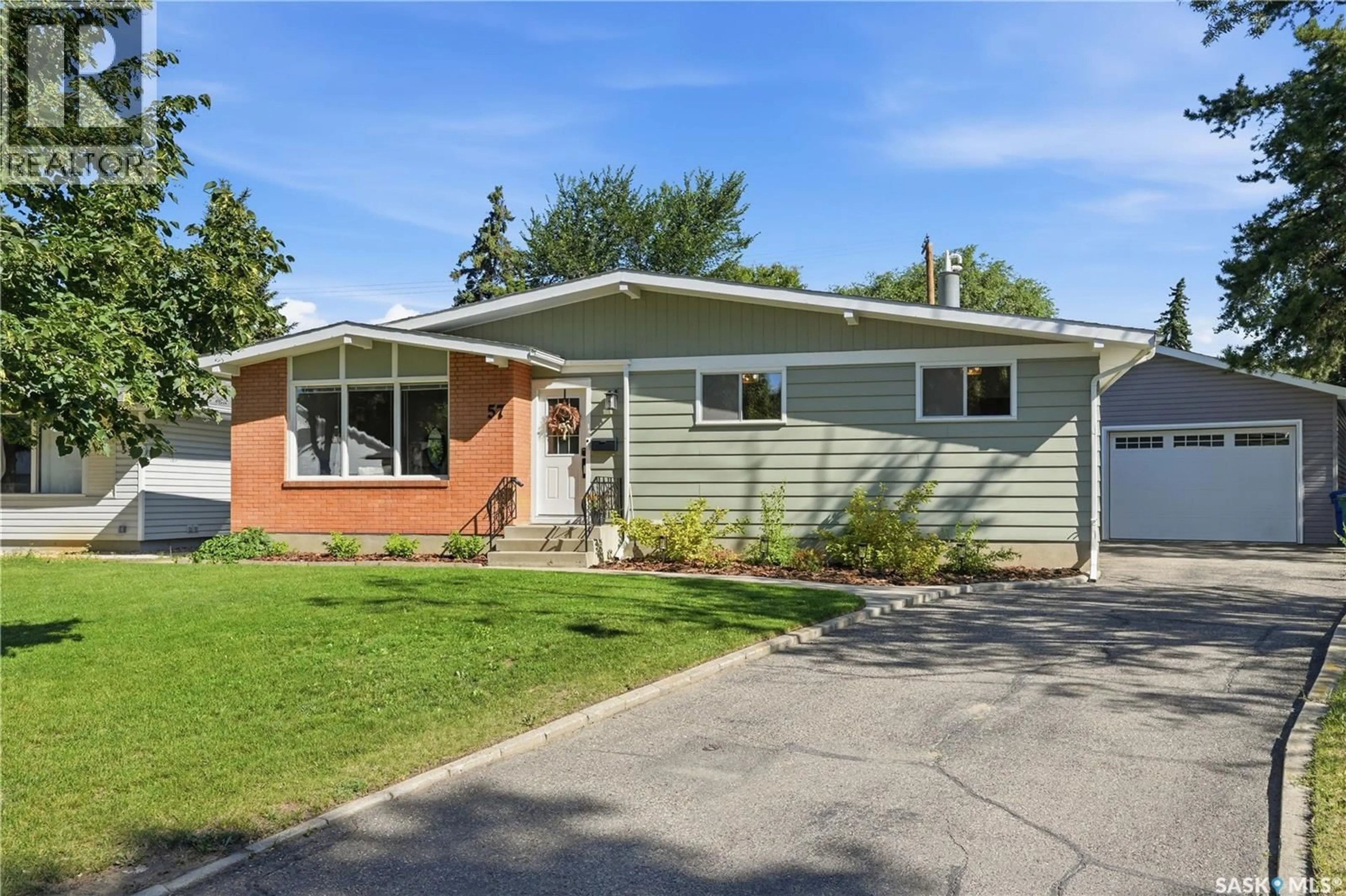 Home with vinyl exterior material, street for 57 POTTER CRESCENT, Saskatoon Saskatchewan S7H3L2
