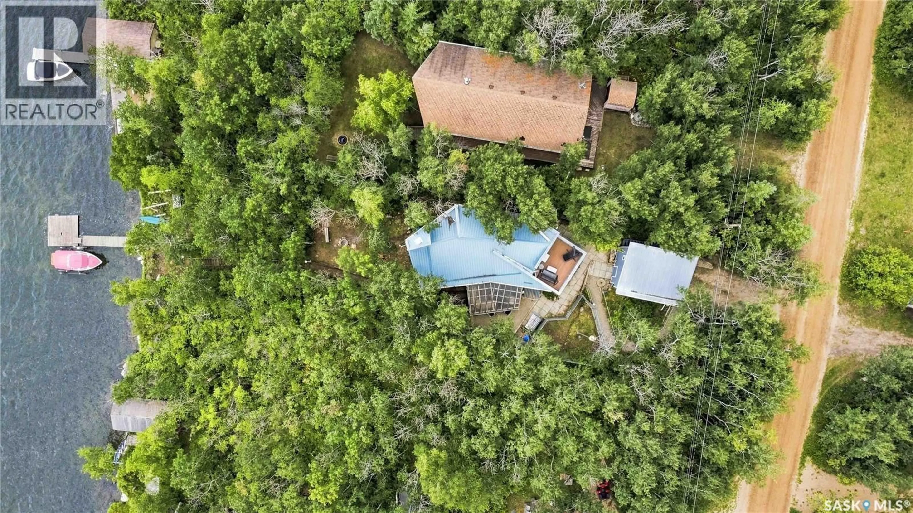 A pic from outside/outdoor area/front of a property/back of a property/a pic from drone, forest/trees view for 3409 NICKORICK BEACH, Wakaw Lake Saskatchewan S0K4P0