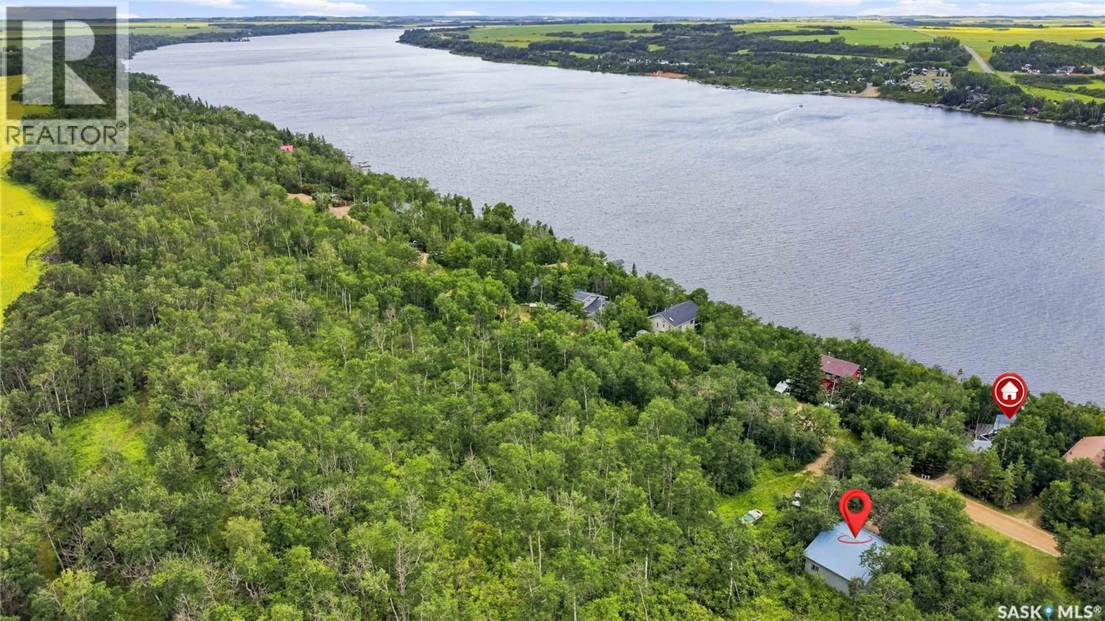 A pic from outside/outdoor area/front of a property/back of a property/a pic from drone, water/lake/river/ocean view for 3409 NICKORICK BEACH, Wakaw Lake Saskatchewan S0K4P0