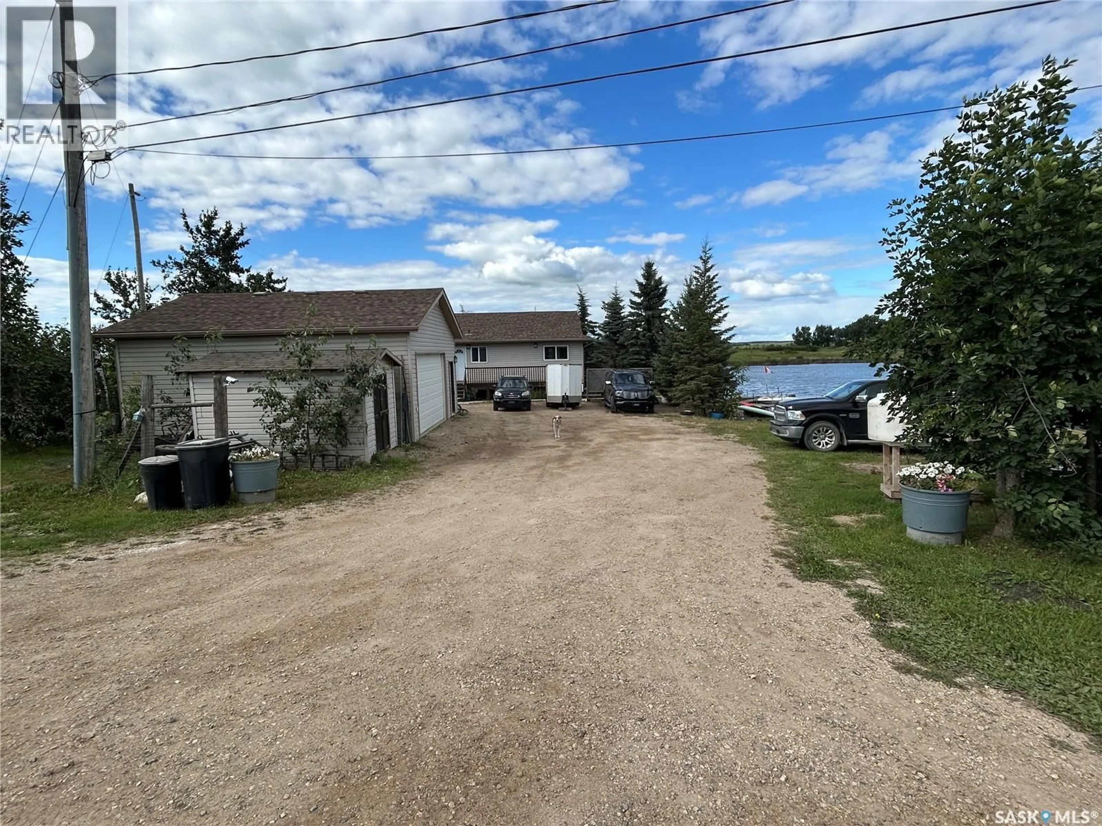A pic from outside/outdoor area/front of a property/back of a property/a pic from drone, water/lake/river/ocean view for 3830 FIRST POINT BEACH DRIVE, Wakaw Lake Saskatchewan S0K4P0