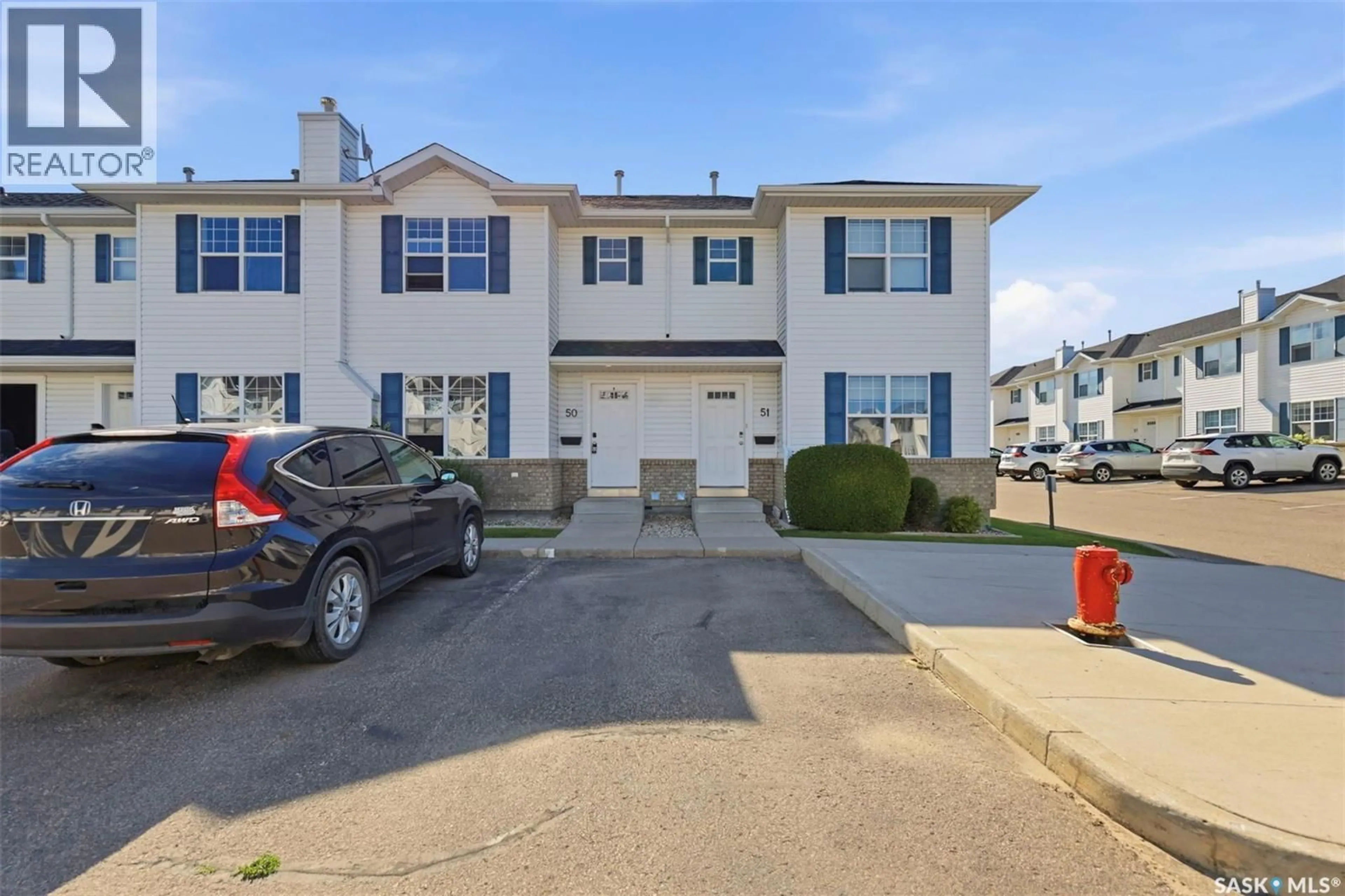 A pic from outside/outdoor area/front of a property/back of a property/a pic from drone, street for 50 203 HEROLD TERRACE, Saskatoon Saskatchewan S7V1H8