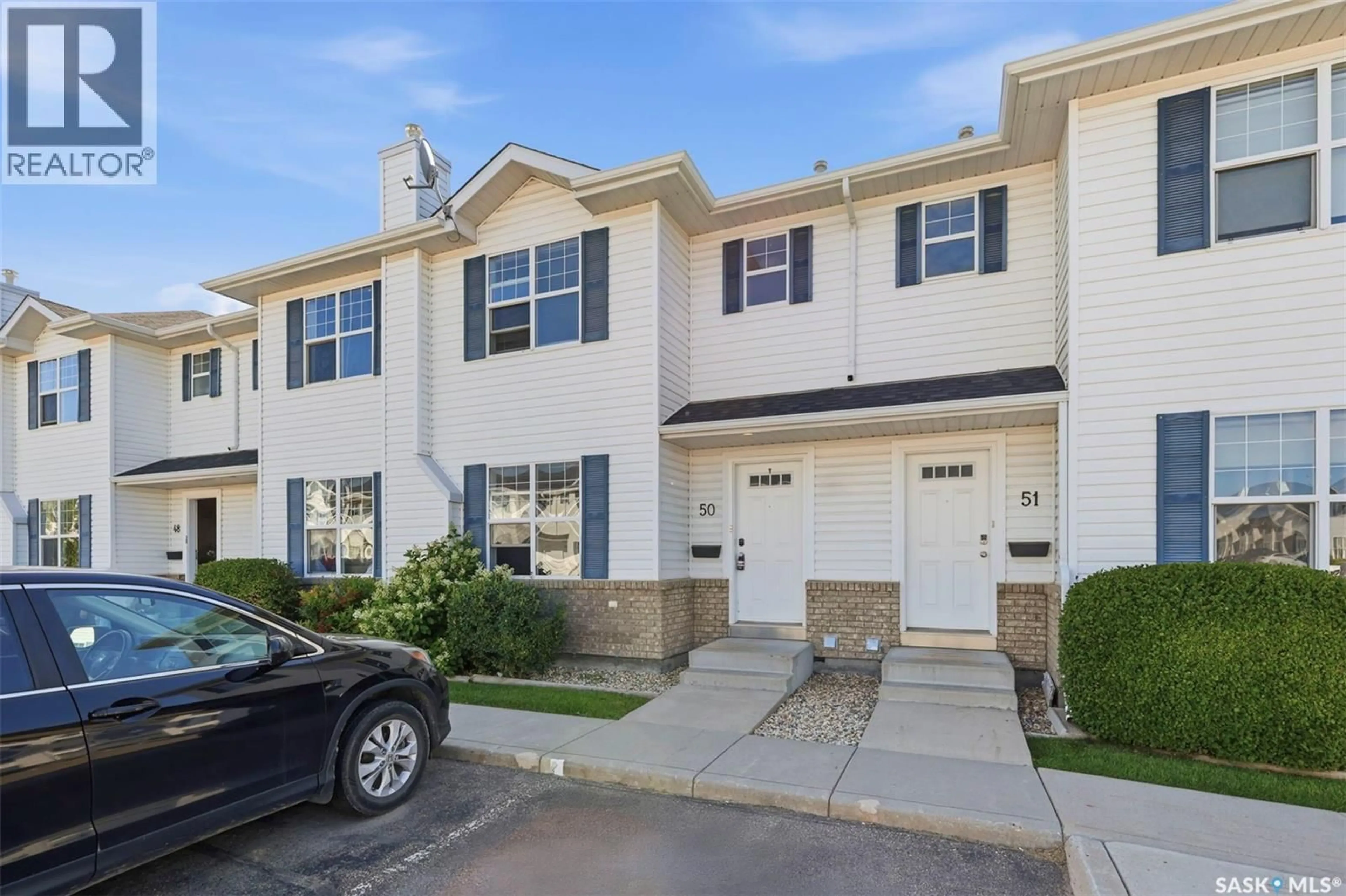 Home with vinyl exterior material, street for 50 203 HEROLD TERRACE, Saskatoon Saskatchewan S7V1H8