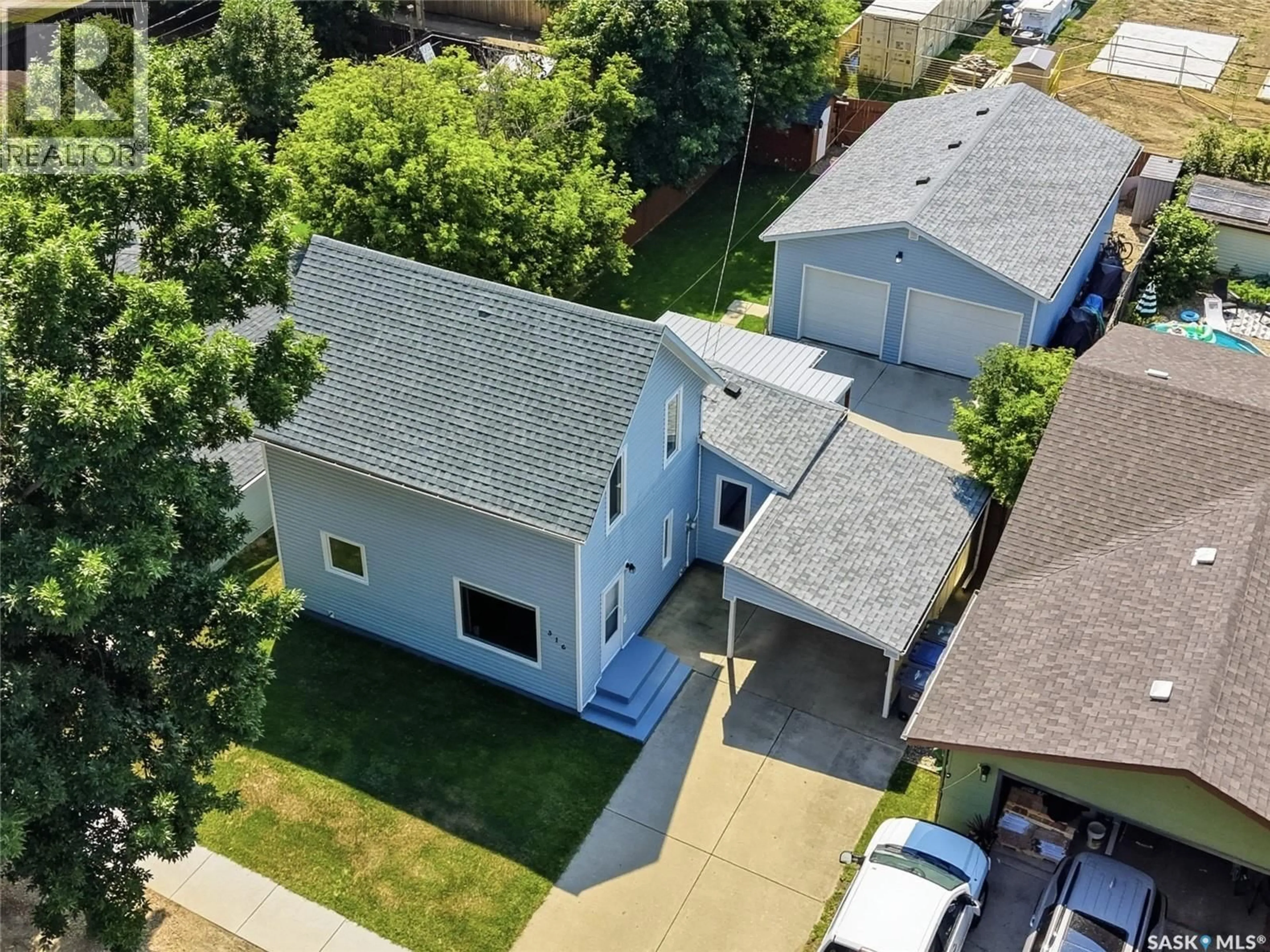 A pic from outside/outdoor area/front of a property/back of a property/a pic from drone, street for 316 1ST STREET, Langham Saskatchewan S0K2L0