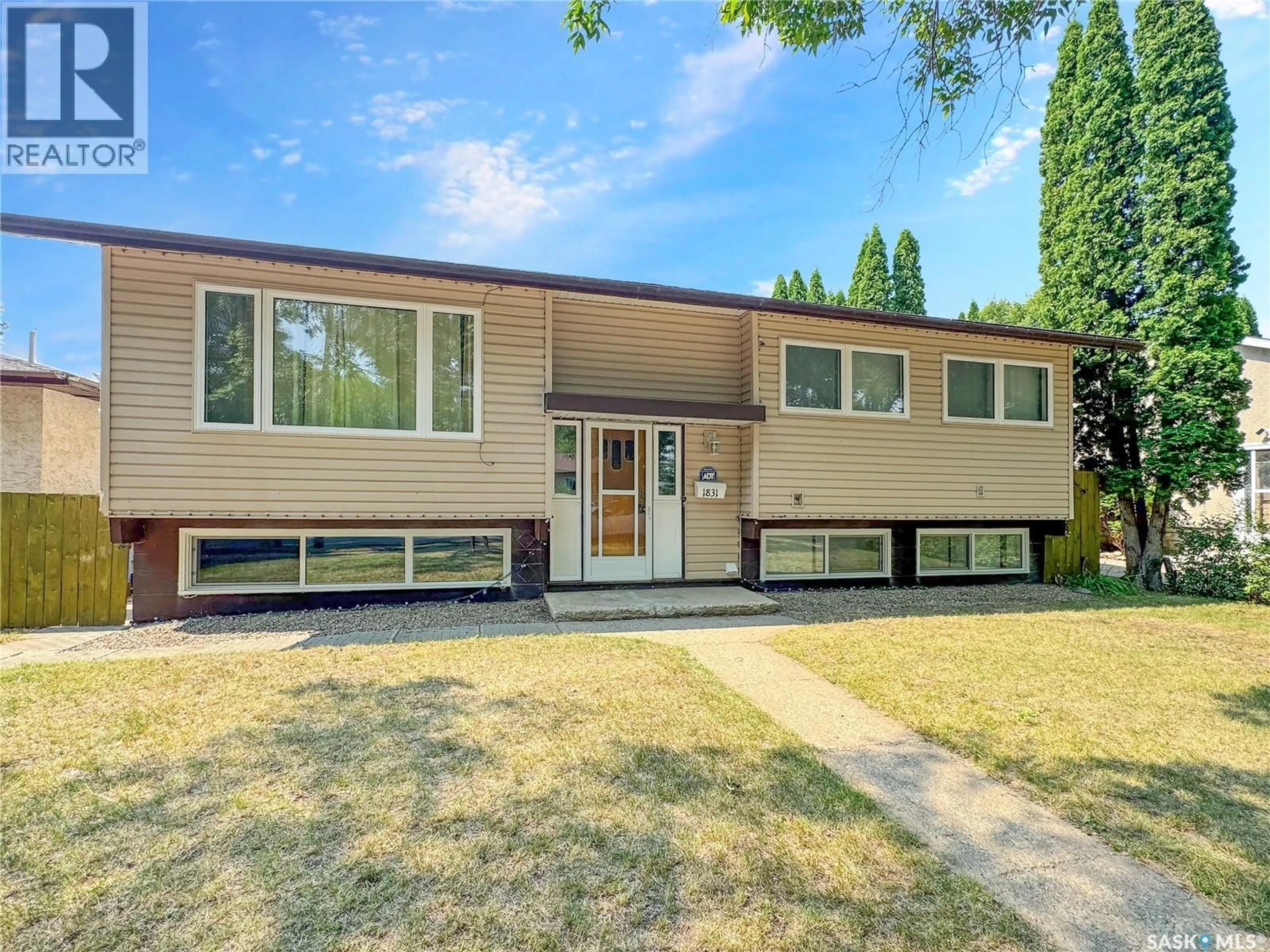 Home with vinyl exterior material, street for 1831 102ND STREET, North Battleford Saskatchewan S9A1H4
