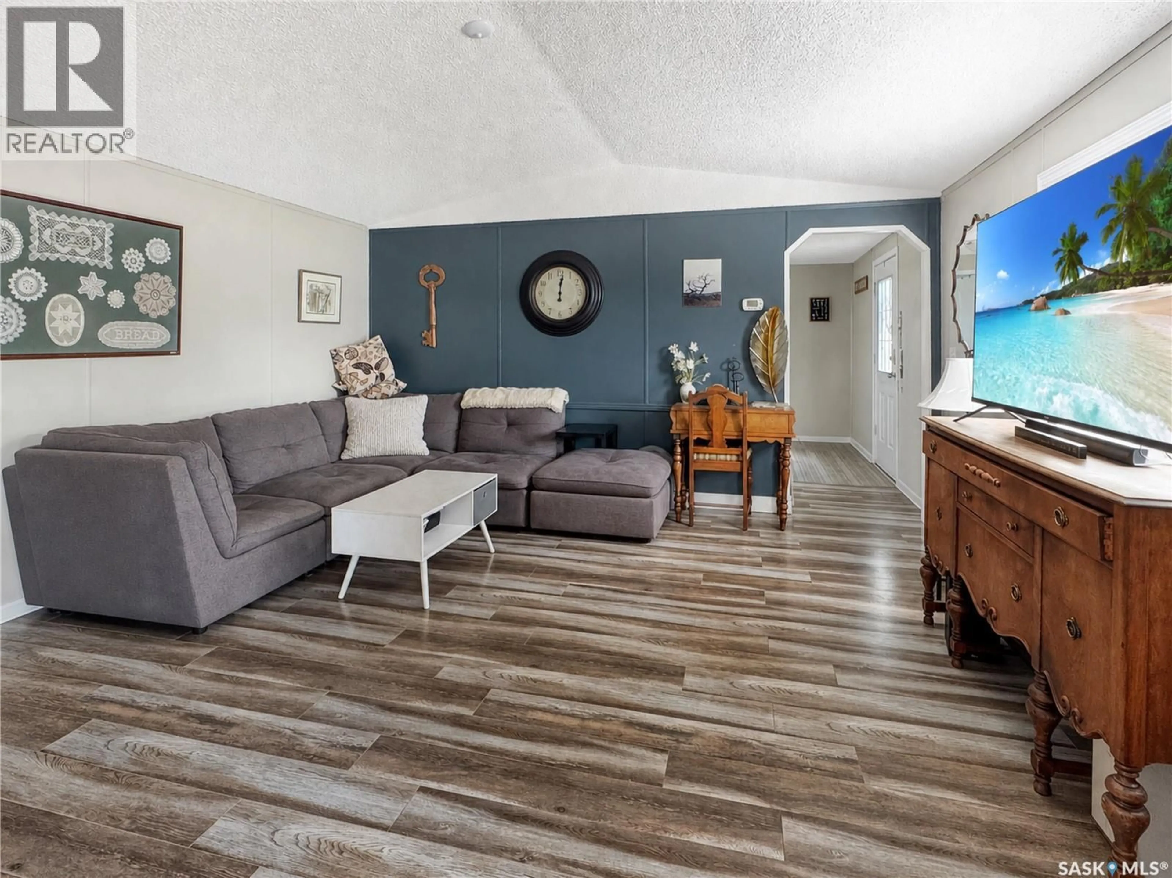 Living room with furniture, unknown for 495 32ND STREET, Battleford Saskatchewan S0M0E0