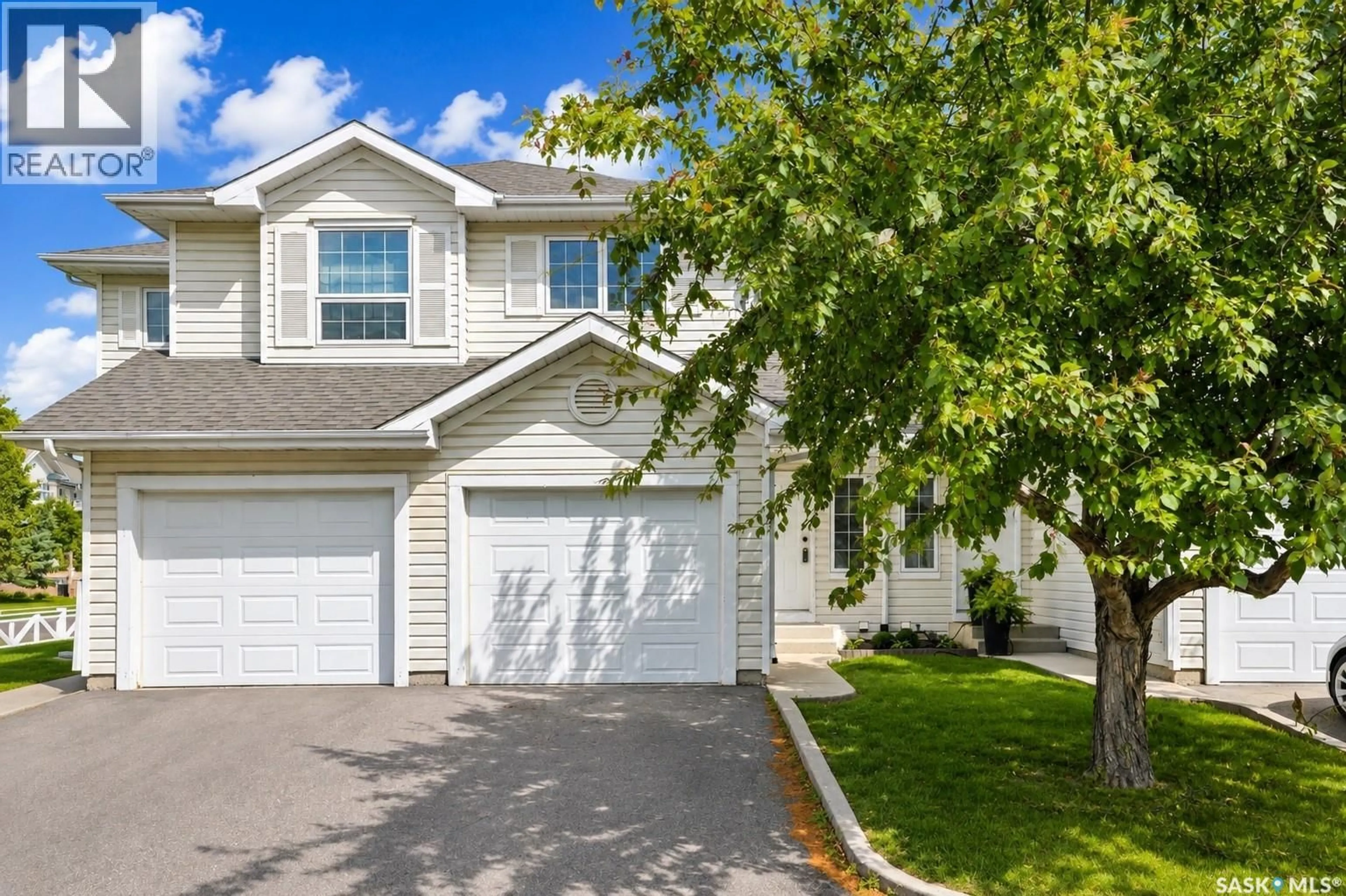 Home with vinyl exterior material, street for 2 110 KEEVIL CRESCENT, Saskatoon Saskatchewan S7N4N8