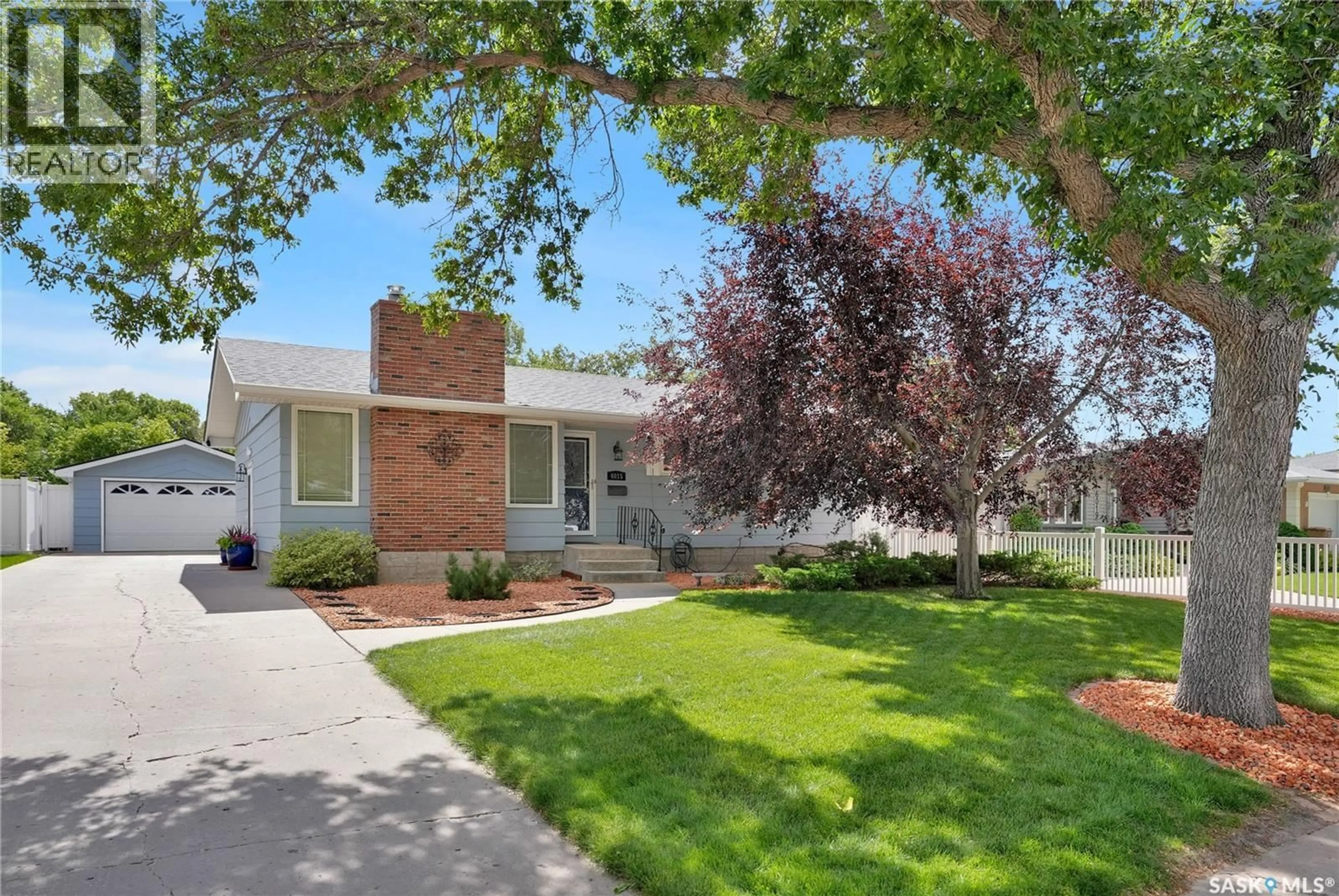 Home with brick exterior material, street for 6015 7TH AVENUE, Regina Saskatchewan S4T6X2