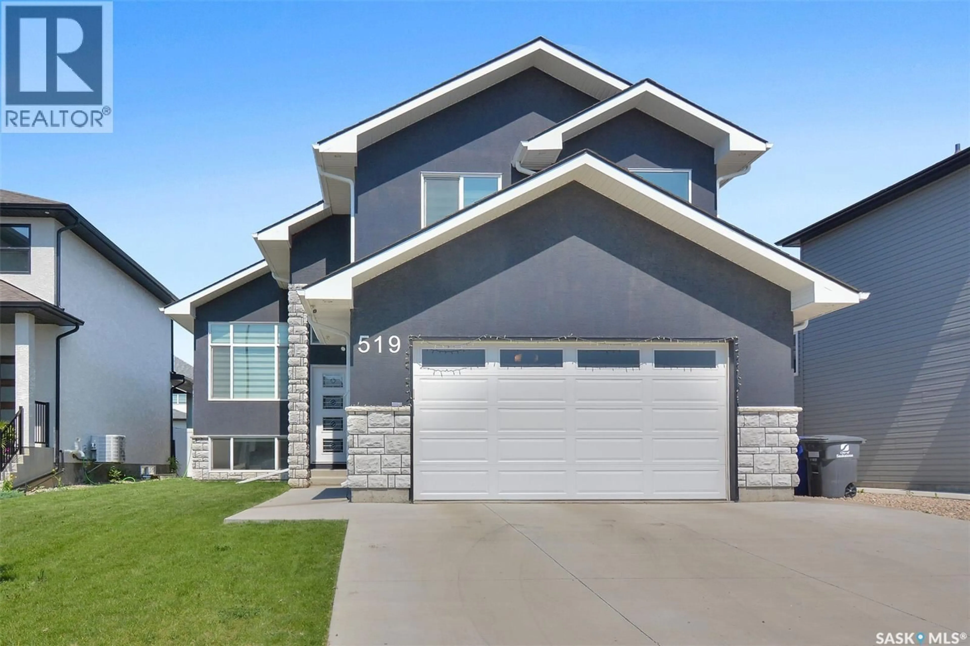 Home with vinyl exterior material, street for 519 KENASCHUK WAY, Saskatoon Saskatchewan S7W0Y5