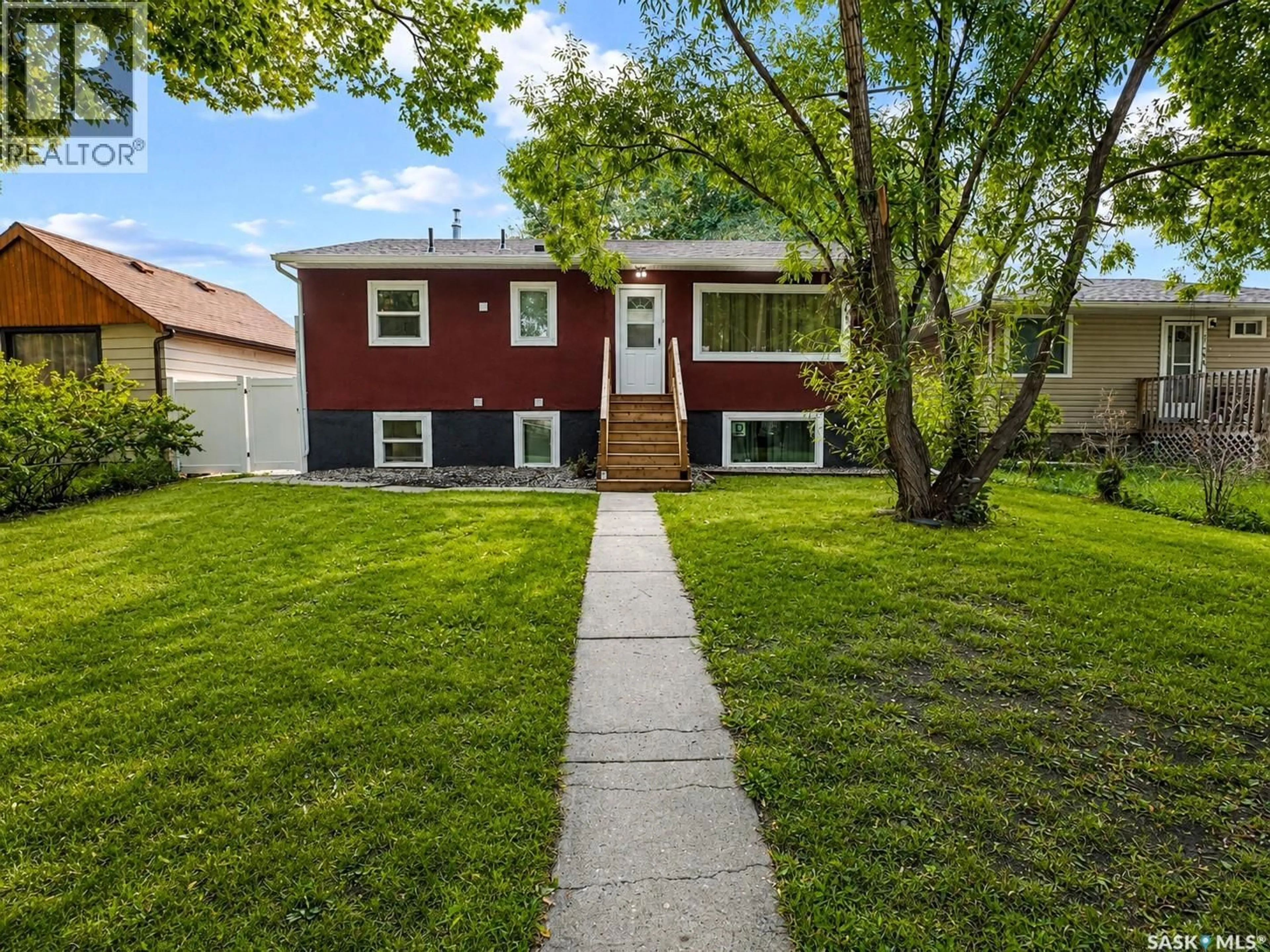 Home with vinyl exterior material, street for 1250 LINDSAY STREET, Regina Saskatchewan S4N3B3