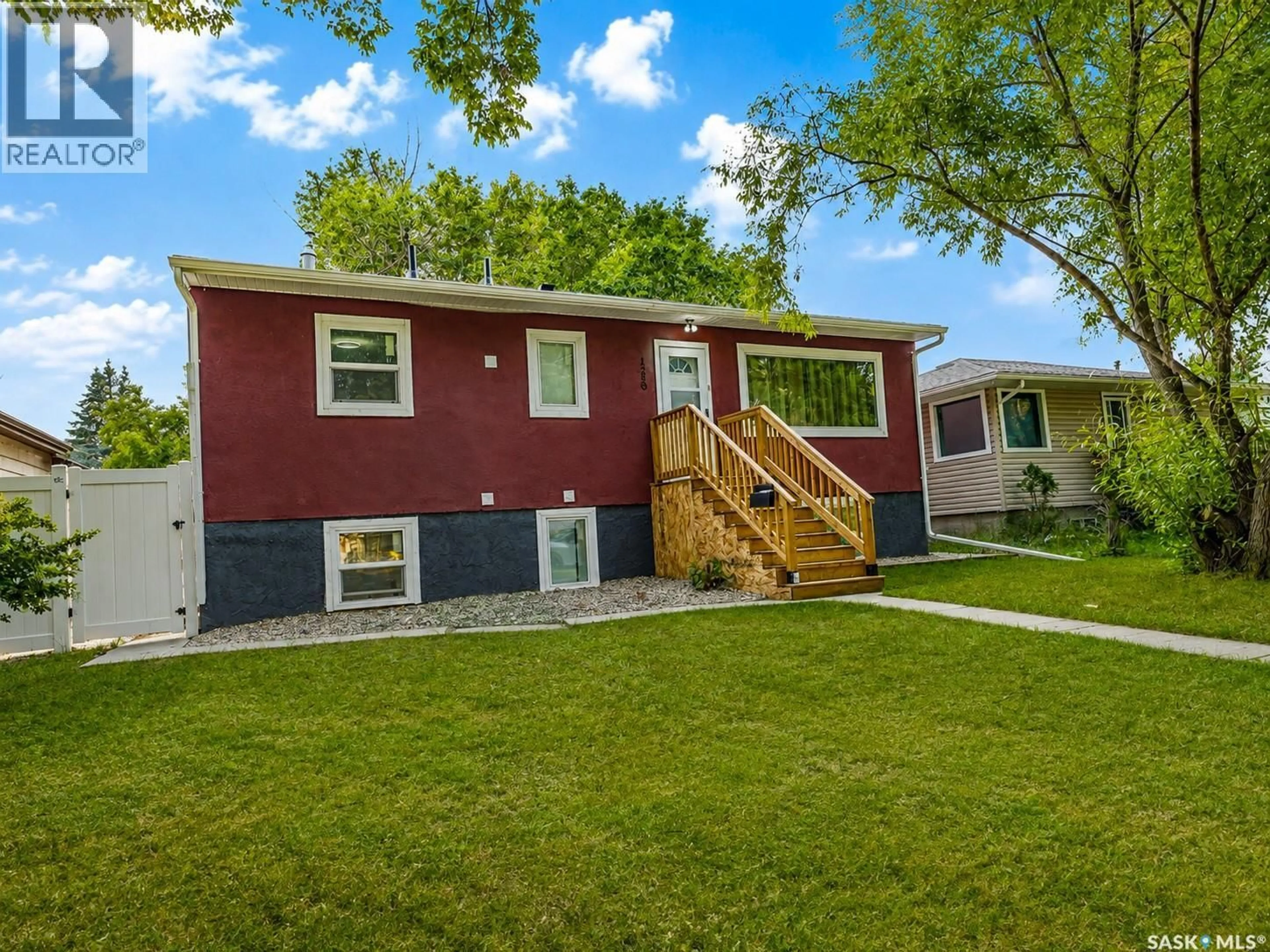 Home with vinyl exterior material, street for 1250 LINDSAY STREET, Regina Saskatchewan S4N3B3