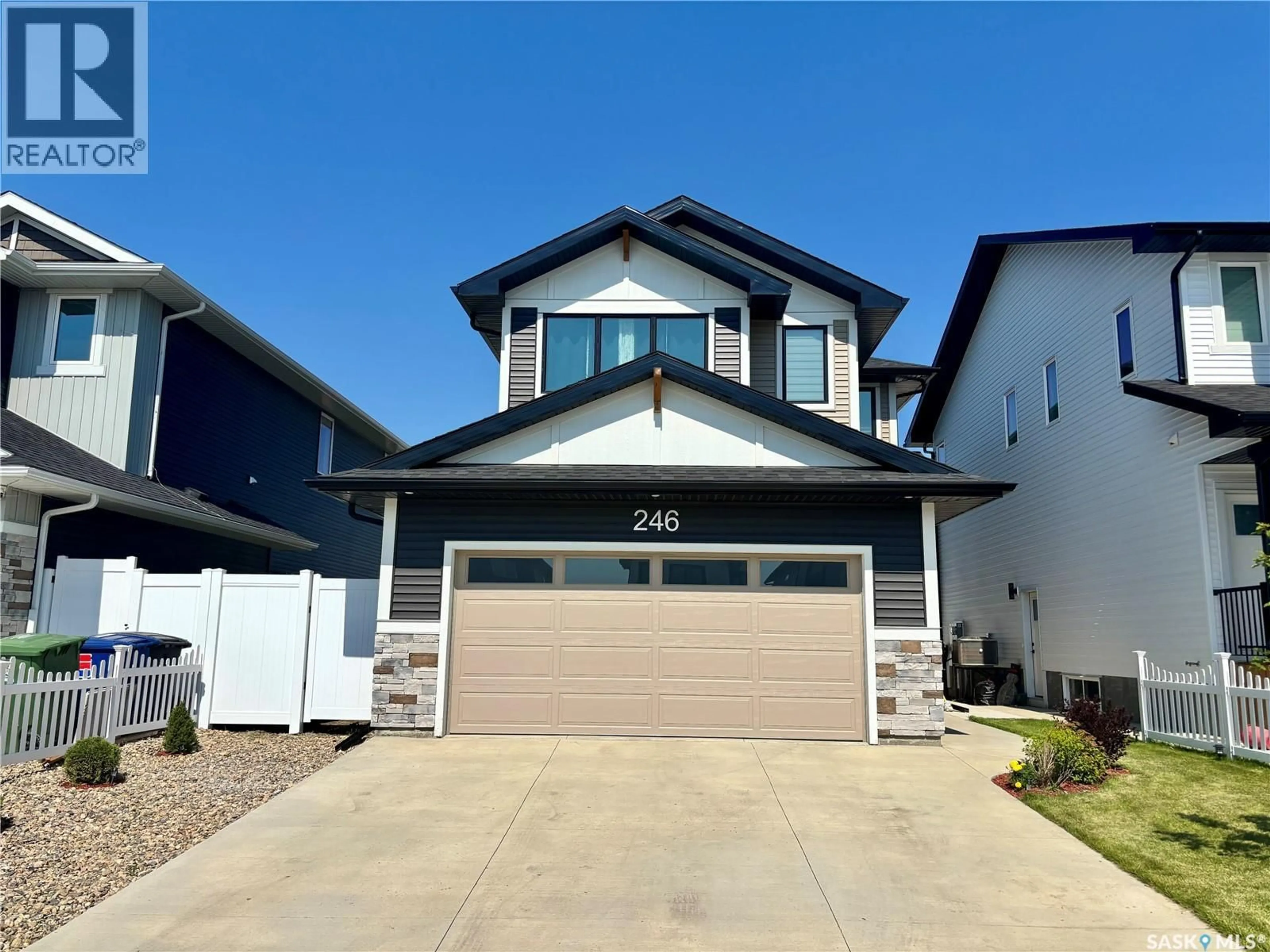Home with vinyl exterior material, street for 246 KATZ COURT, Saskatoon Saskatchewan S7H4R1