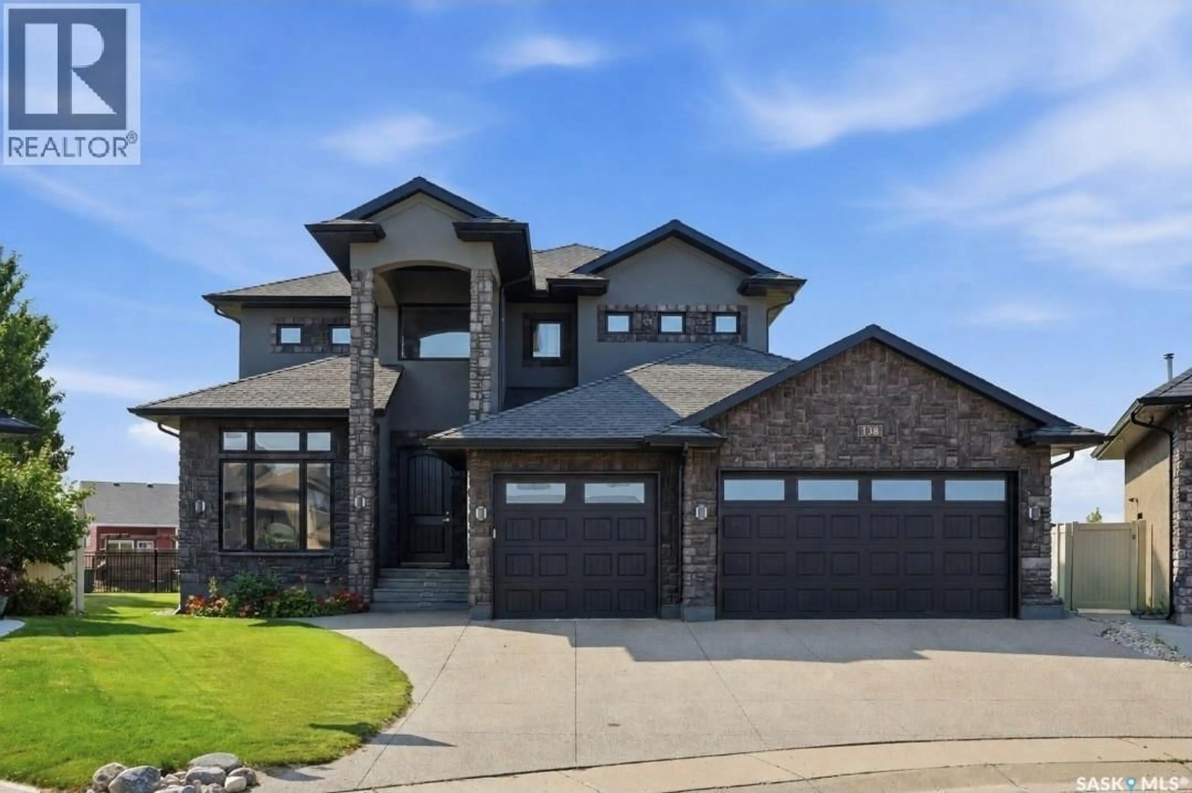 Home with brick exterior material, street for 138 FLEGEL COURT, Saskatoon Saskatchewan S7V0B9