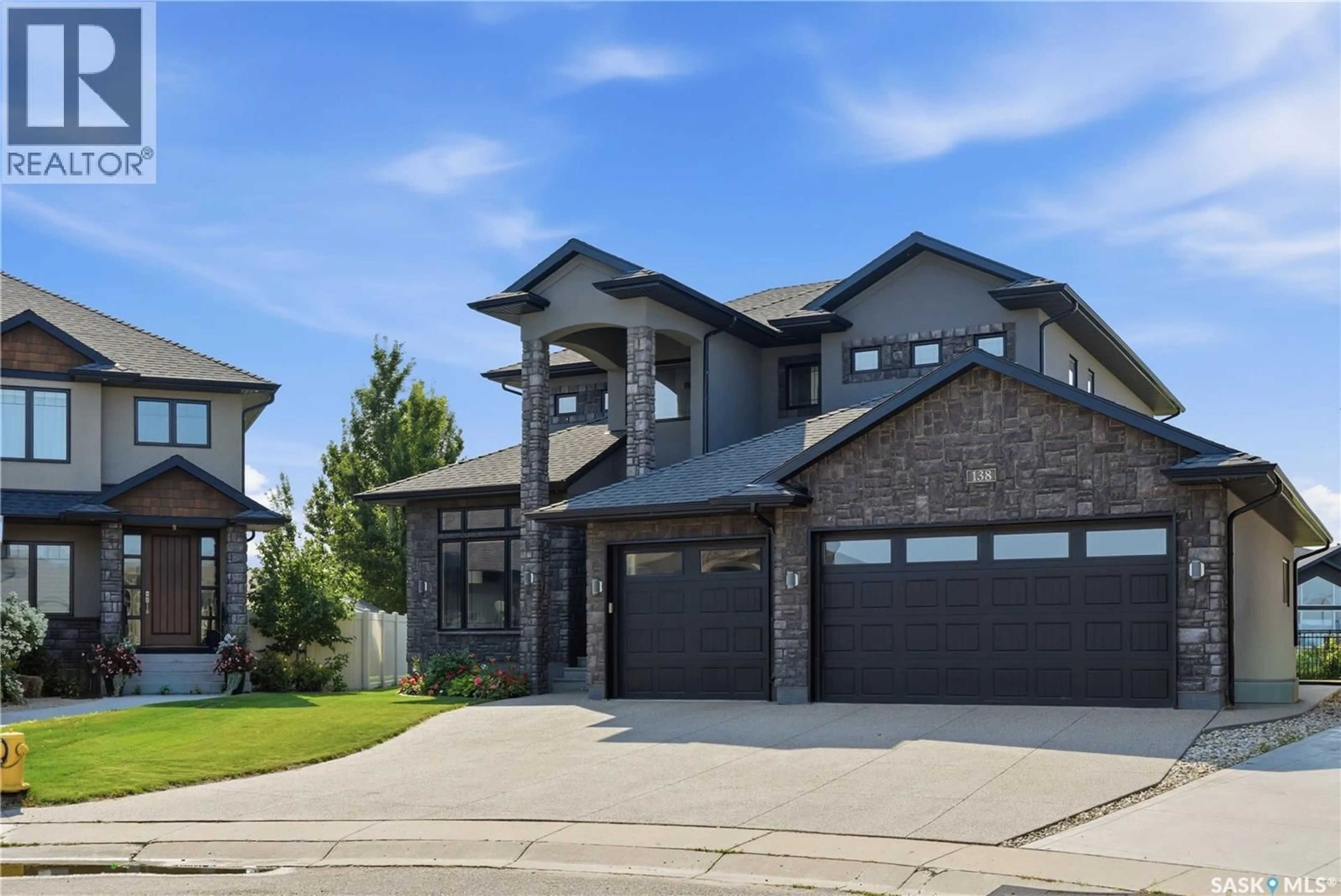 Home with brick exterior material, street for 138 FLEGEL COURT, Saskatoon Saskatchewan S7V0B9