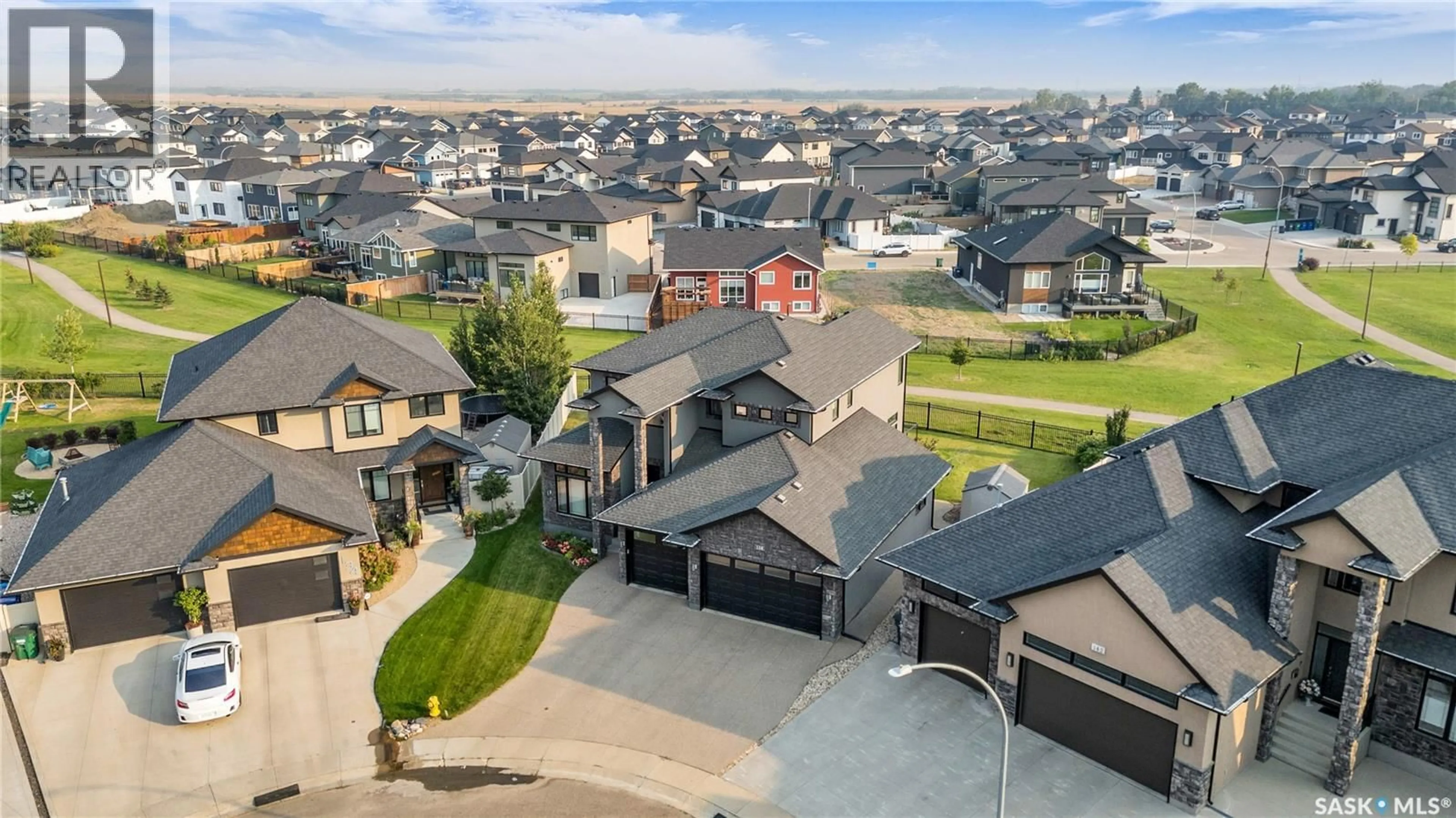 A pic from outside/outdoor area/front of a property/back of a property/a pic from drone, street for 138 FLEGEL COURT, Saskatoon Saskatchewan S7V0B9